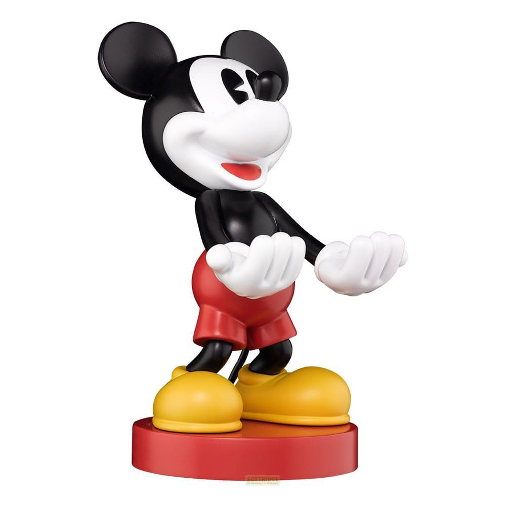 Statua di Topolino con pantaloncini rossi, scarpe gialle, su base rossa.