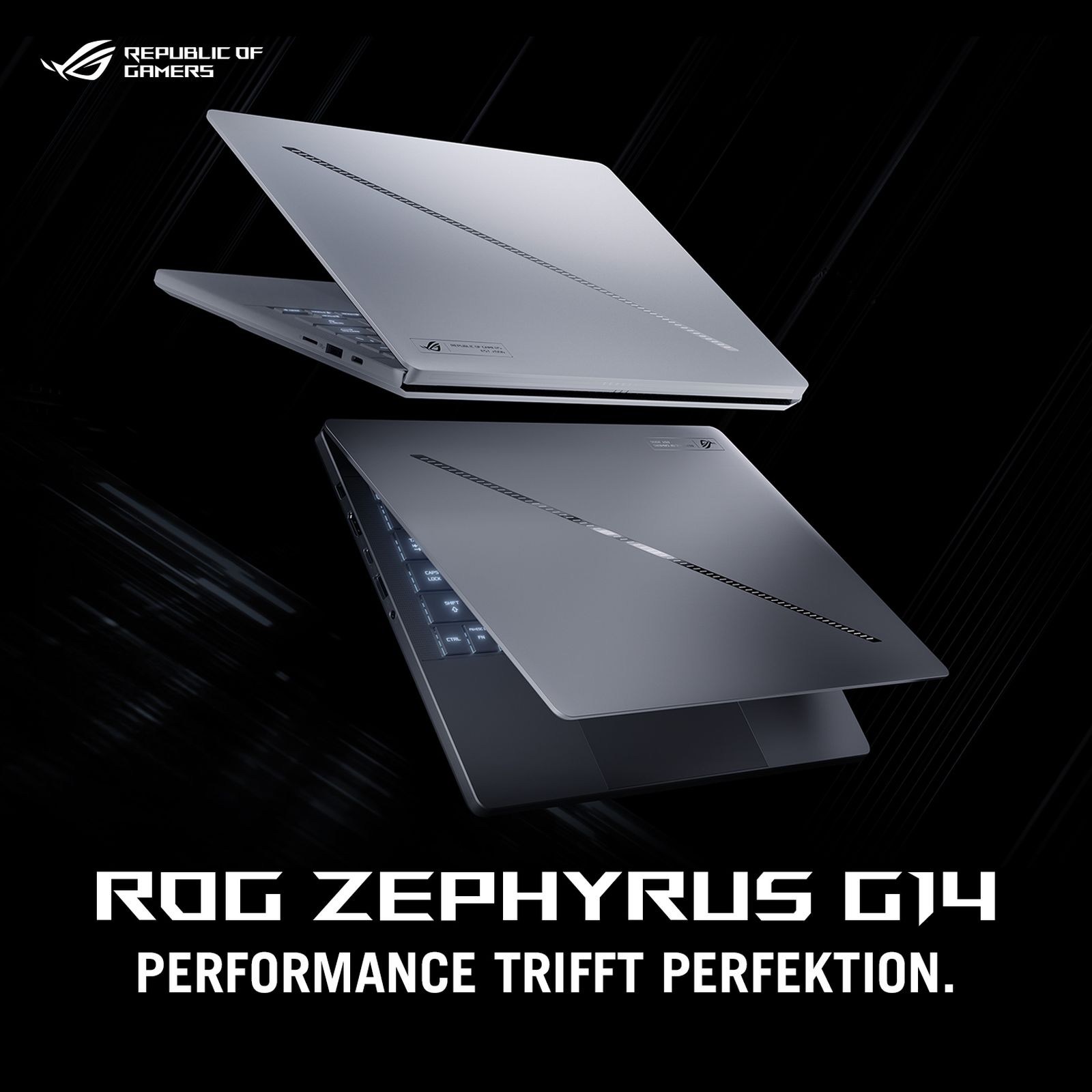 Dwa szare laptopy ASUS ROG Zephyrus G14 na ciemnym tle. Jeden jest otwarty, widać klawiaturę.