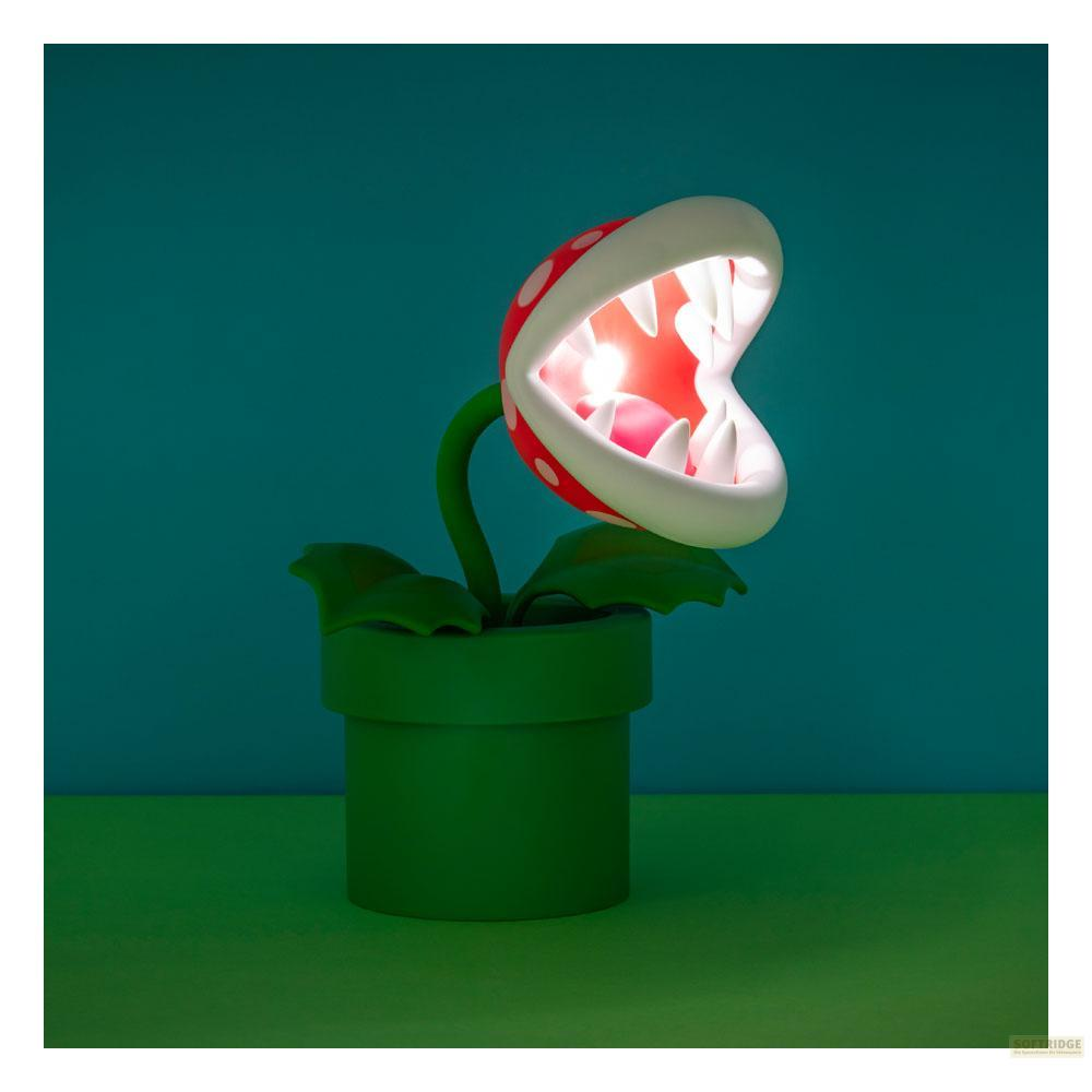 Lampa Piranha Plant z Super Mario w zielonej rurze, podświetlona od wewnątrz.