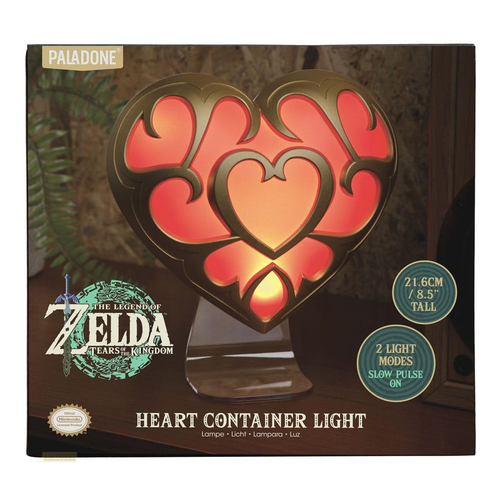 La luz del Contenedor de Corazones de Zelda Tears of the Kingdom en su caja.