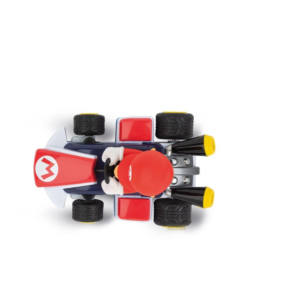 Coche de juguete Mario Kart con personaje, colores rojo, azul, blanco y negro.