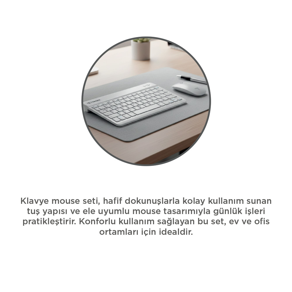 Ahşap bir masanın üzerindeki gri matta beyaz klavye ve fare.