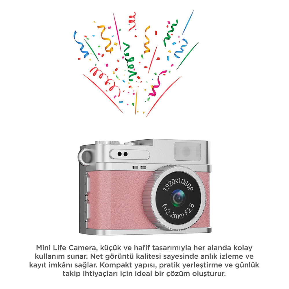 Üzerinde konfeti olan pembe mini bir fotoğraf makinesi.