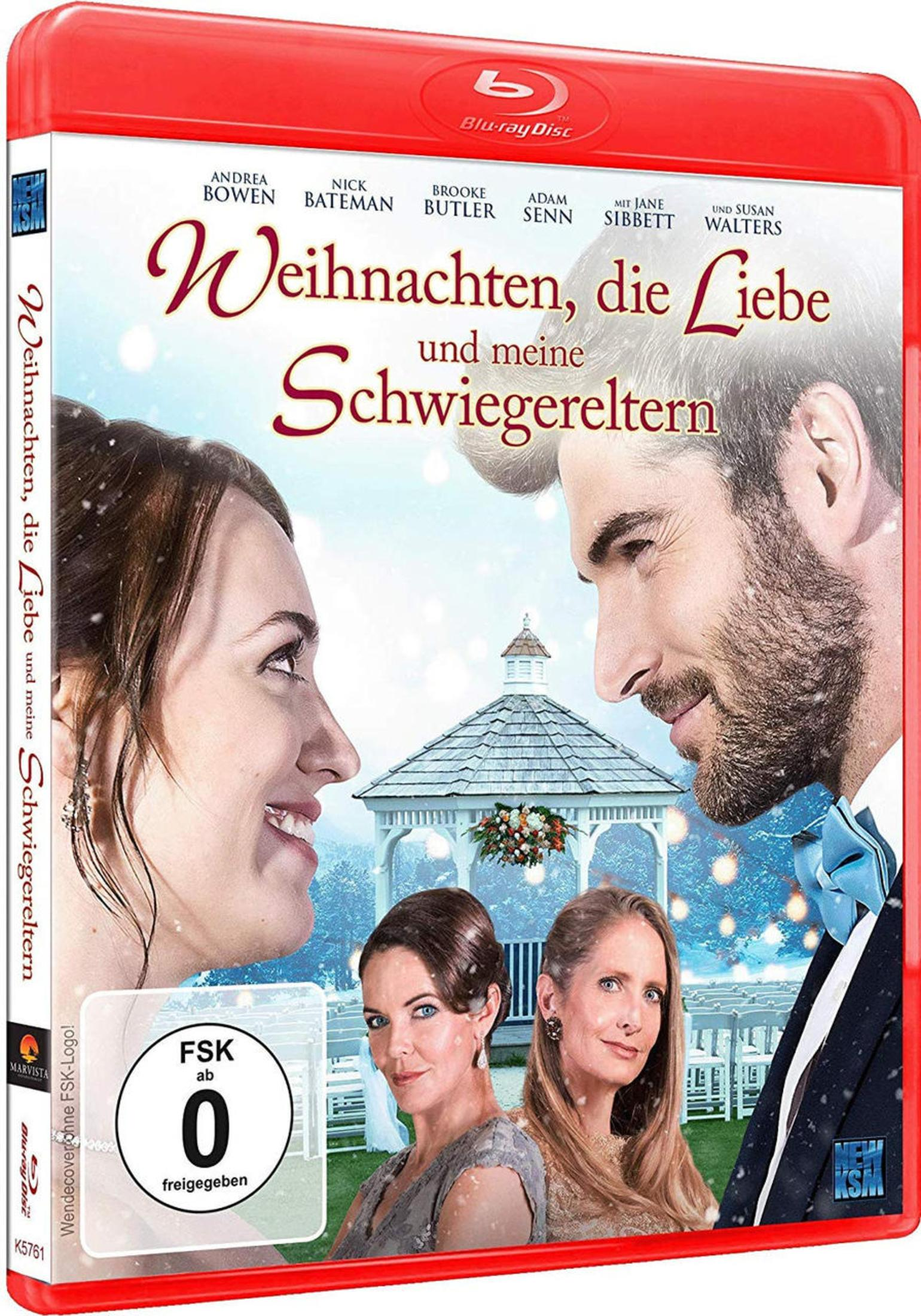 Copertina Blu-ray: Coppia che si guarda, gazebo, due donne, testo 'Weihnachten, die Liebe und meine Schwiegereltern'.