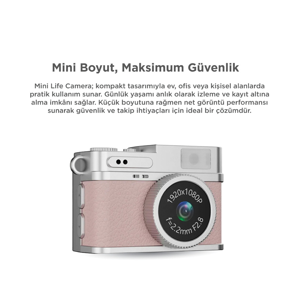 Gümüş detaylı, kayıt lensli kompakt pembe kamera.