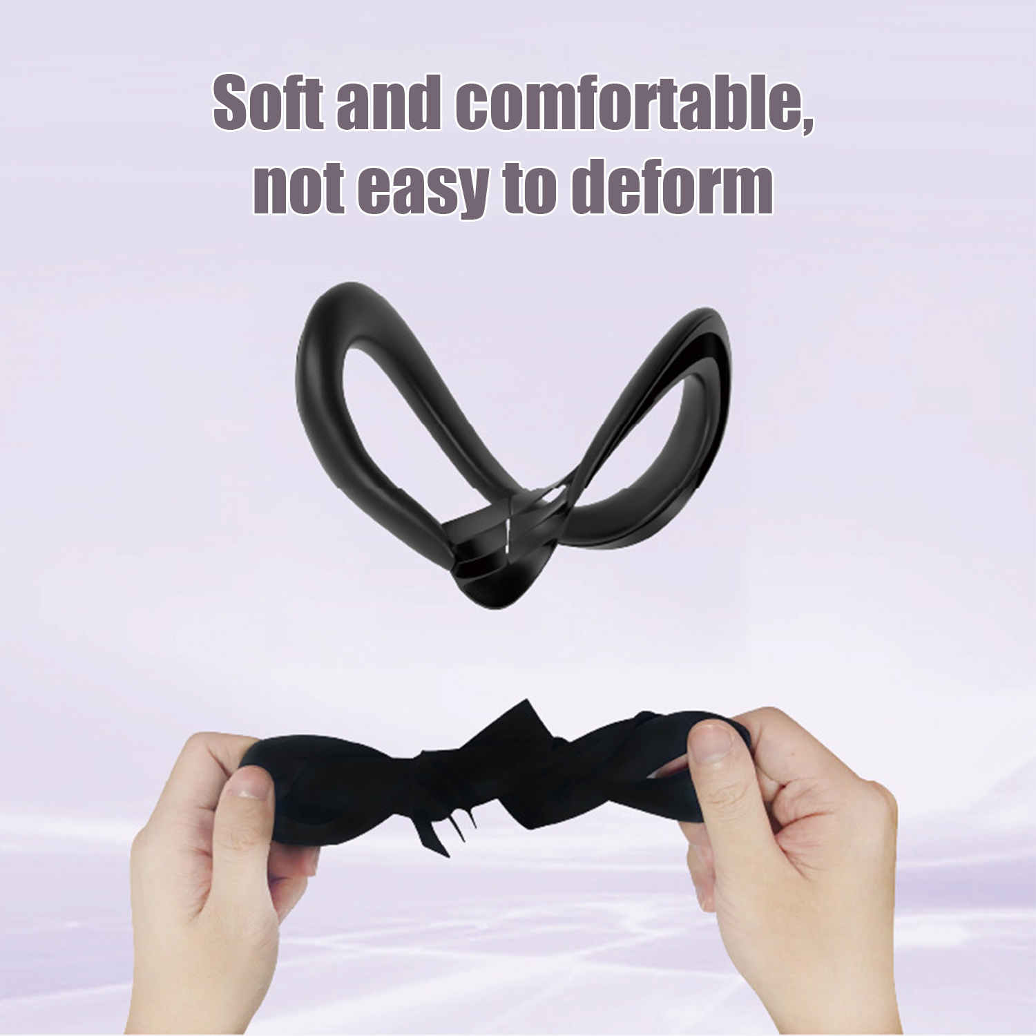 Ręce rozciągają czarny, elastyczny materiał. Czarna ramka jest na górze.