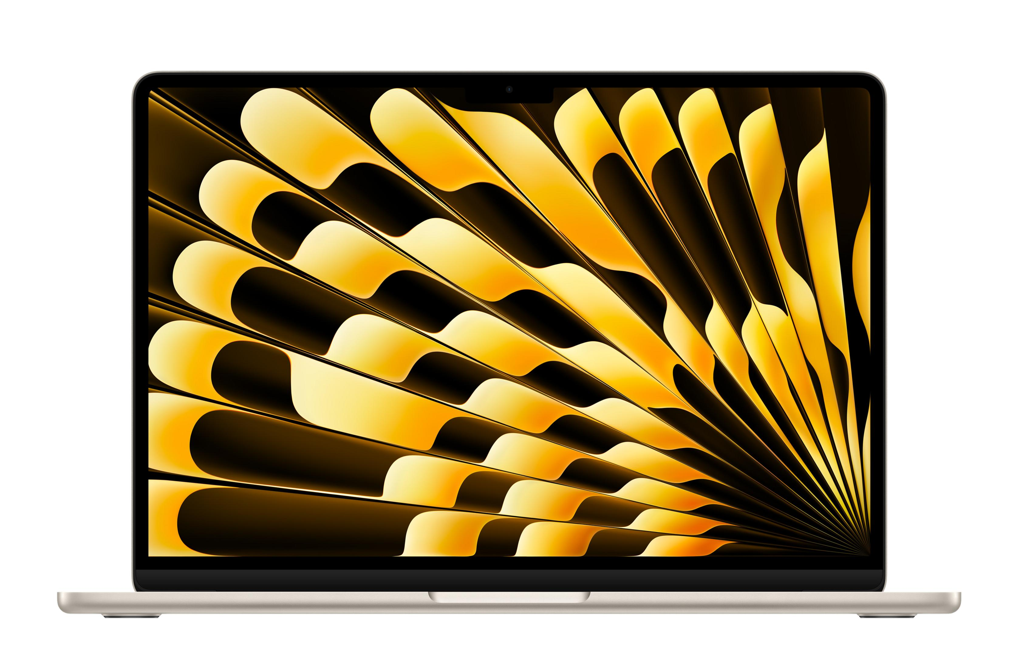 Srebrny laptop z ekranem wyświetlającym złoty wzór przypominający wachlarz.