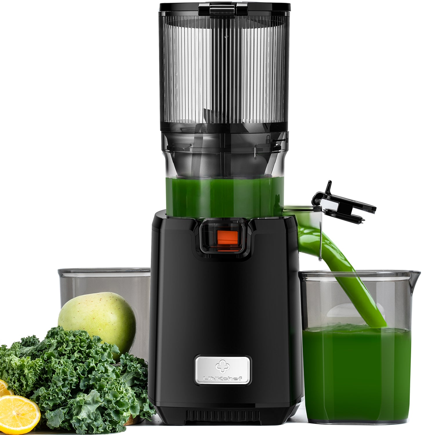 Un estrattore nero fa succo verde da cavolo riccio, mela e limone.