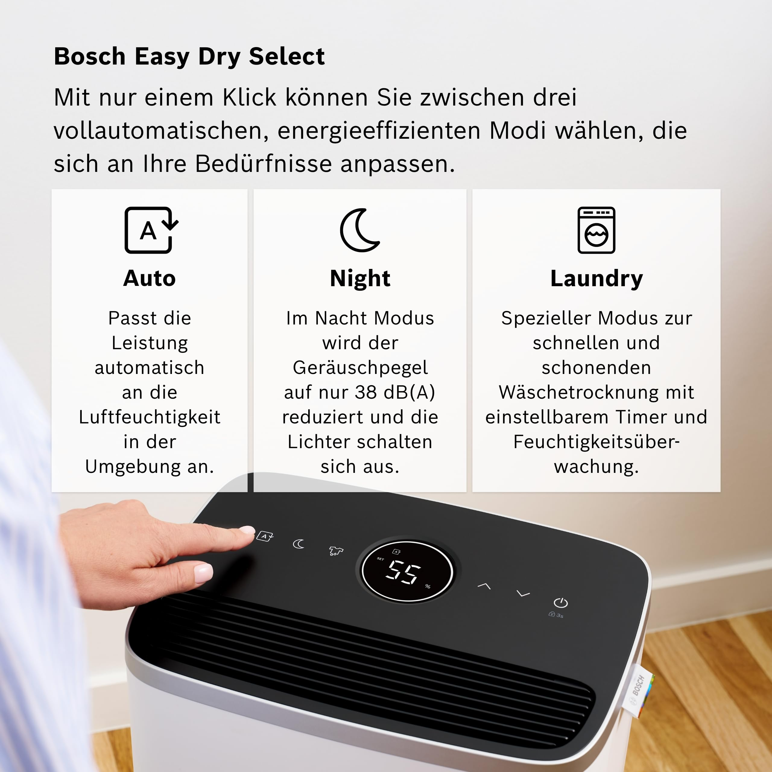 Bosch Easy Dry Select: Drei Modi angezeigt: Auto, Night, Laundry. Ein Finger berührt den Bildschirm.