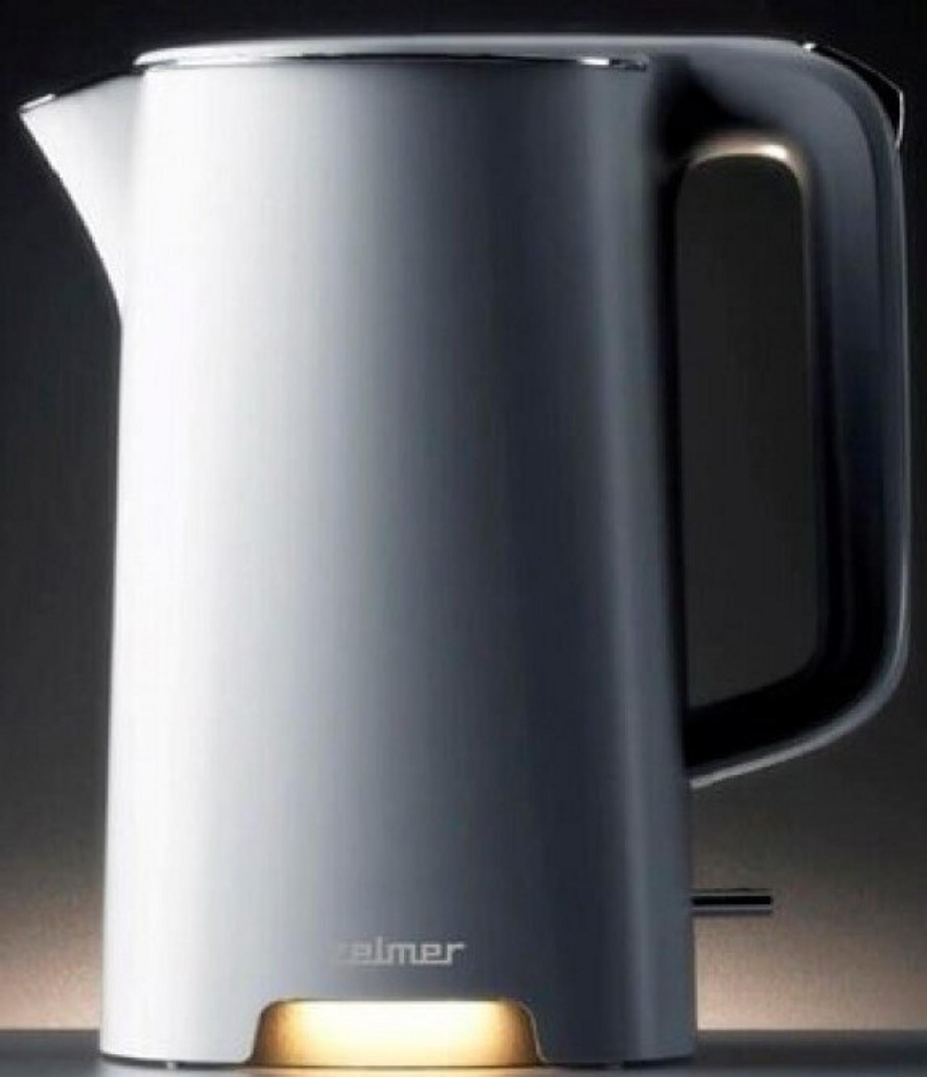 Un bollitore moderno bianco con manico nero e base luminosa.