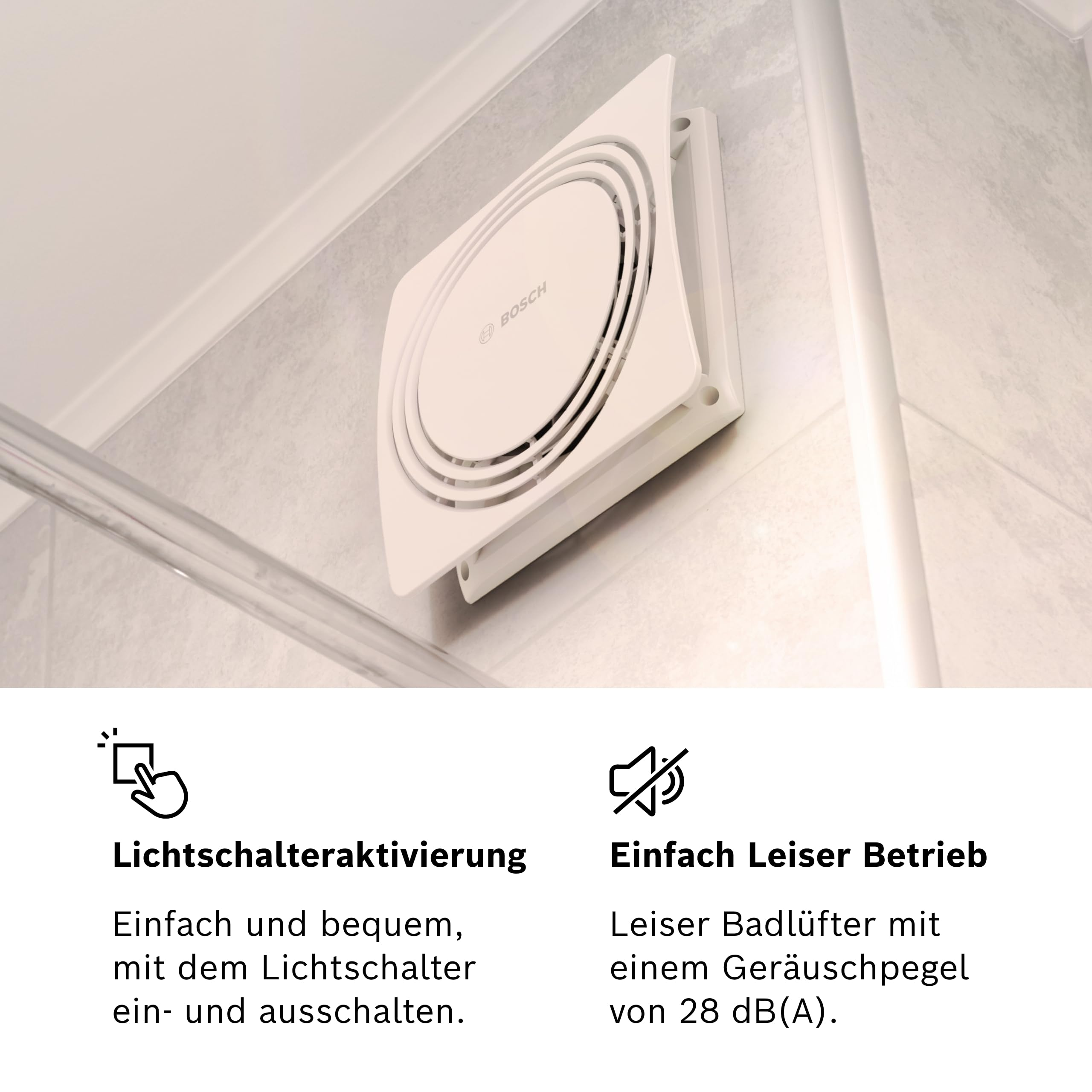 Ventilatore da bagno Bosch bianco montato su parete piastrellata. Attivazione interruttore e funzionamento silenzioso.