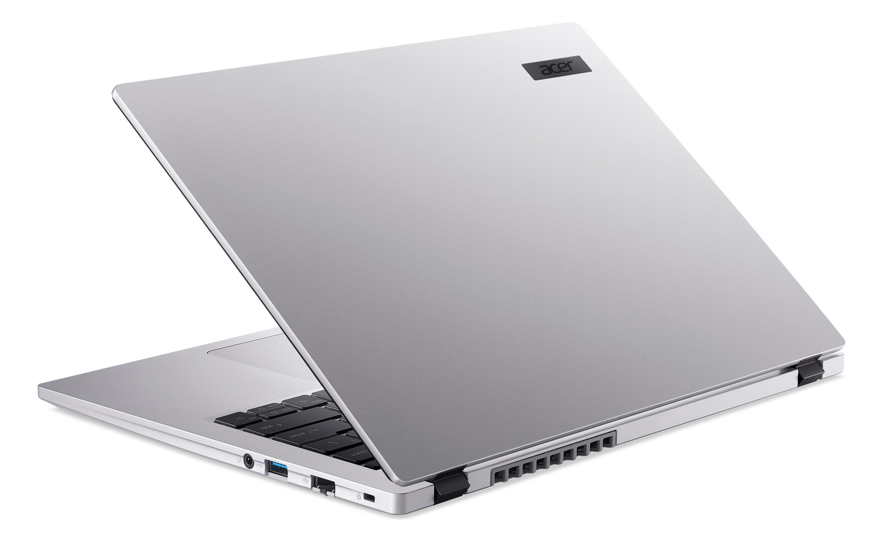Laptop Acer argentato, parzialmente aperto, mostra tastiera e porte. Logo Acer sul coperchio.