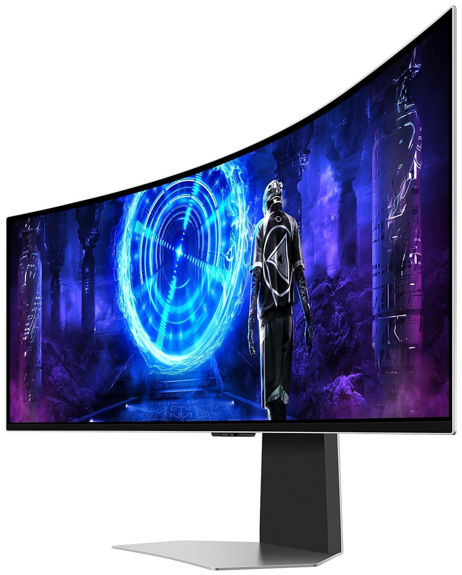 Una figura futuristica si trova davanti a un portale blu luminoso su un monitor curvo.