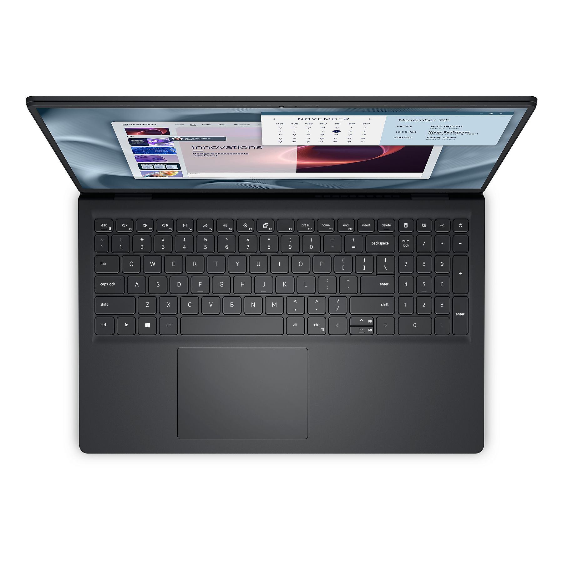 Un laptop grigio scuro è aperto, mostrando un calendario e un programma sullo schermo.