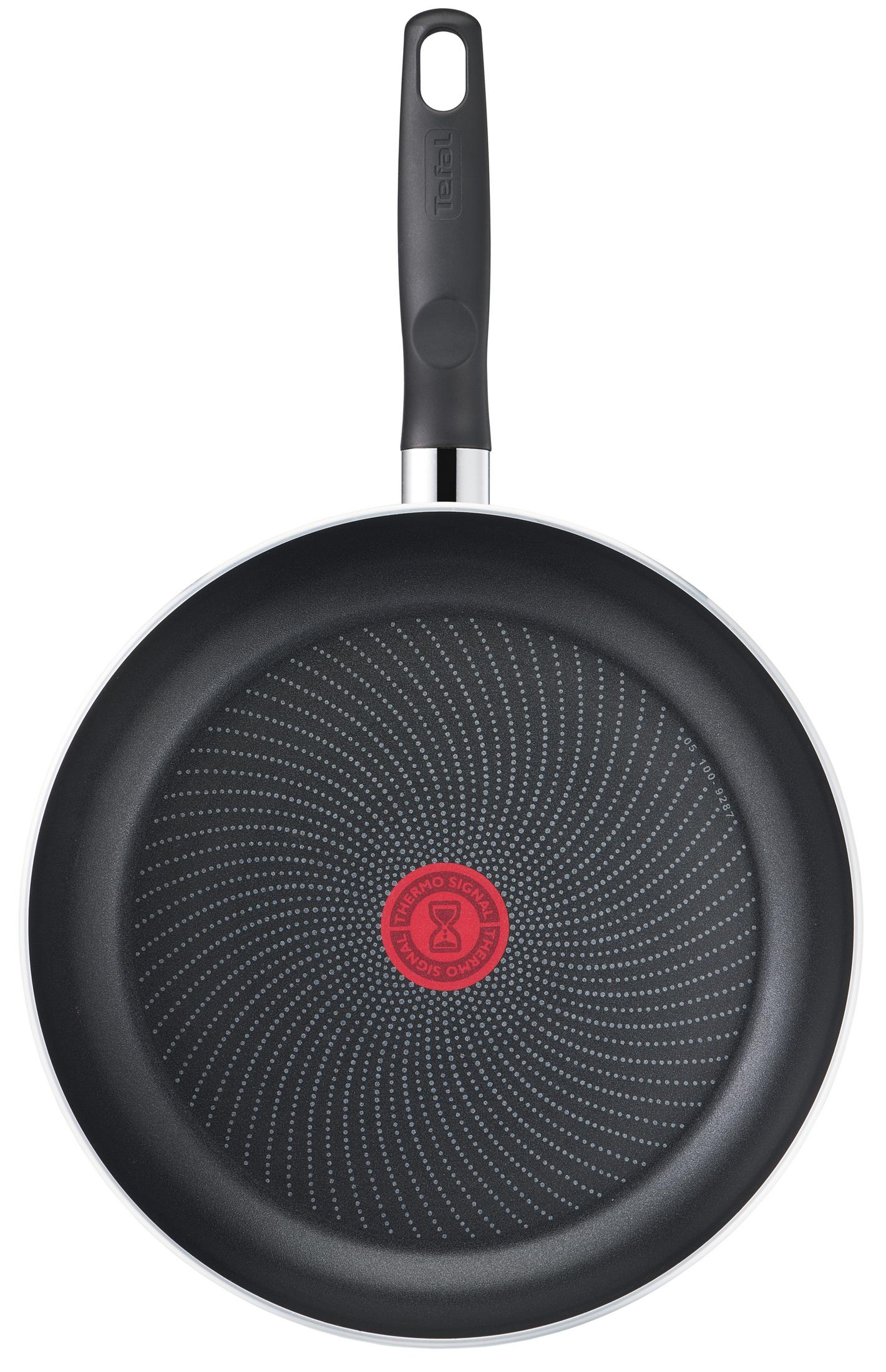 Egy fekete Tefal serpenyő felülnézetből, piros Thermo-Signal jelzéssel.