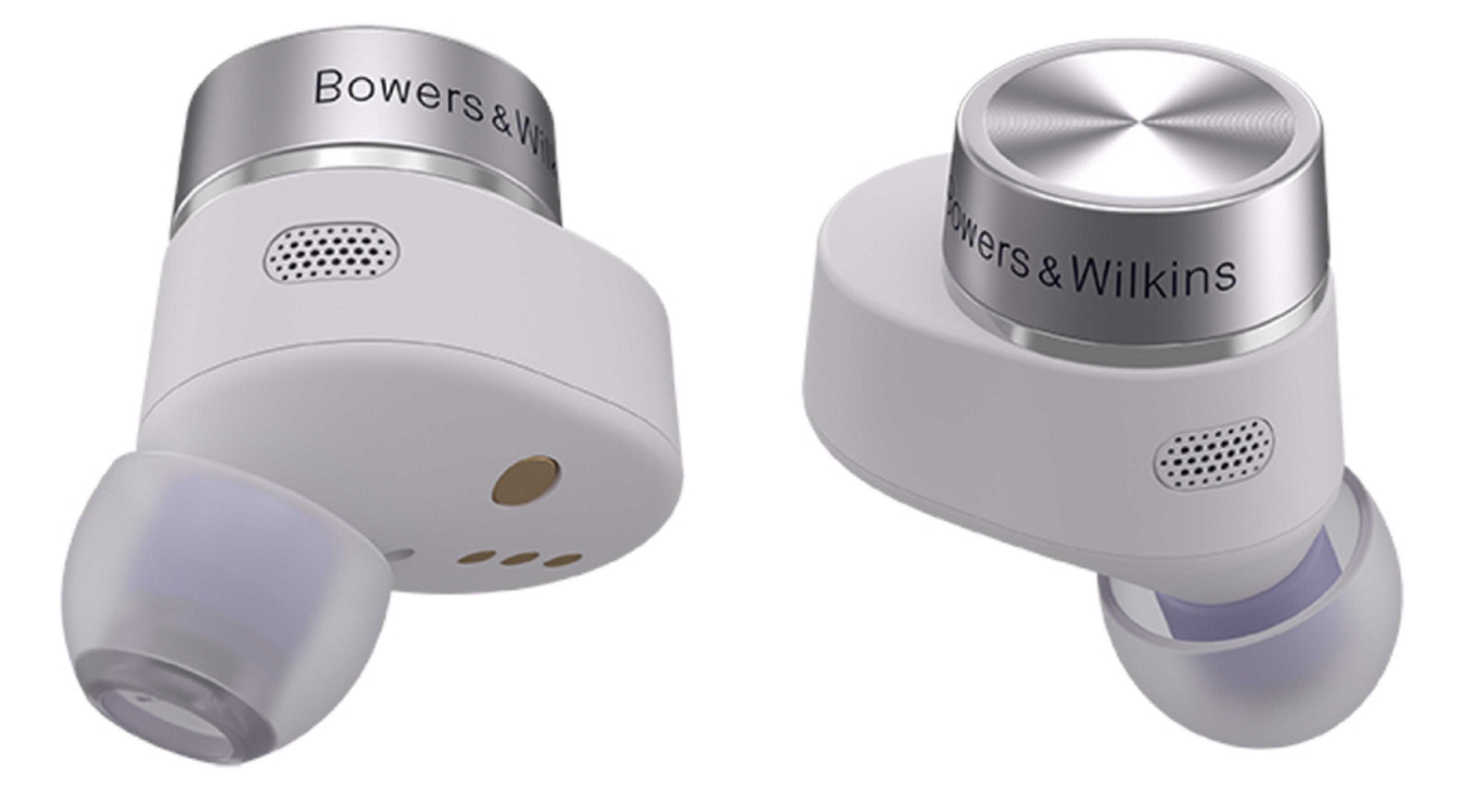 Due auricolari bianchi Bowers & Wilkins con tappi argentati su sfondo bianco.