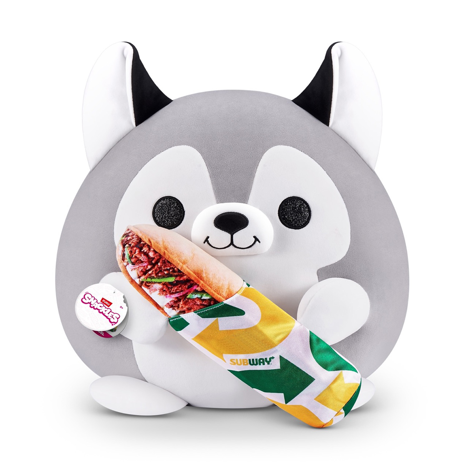 Ein grauer Husky-Plüschtier hält ein Sandwich von Subway.