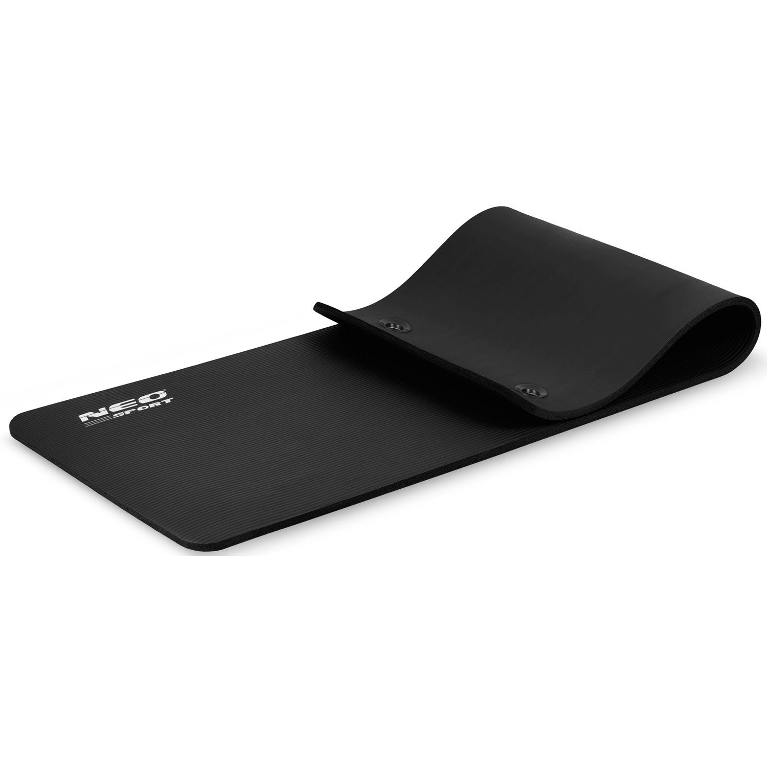 Esterilla de yoga negra con textura acanalada, parcialmente enrollada.