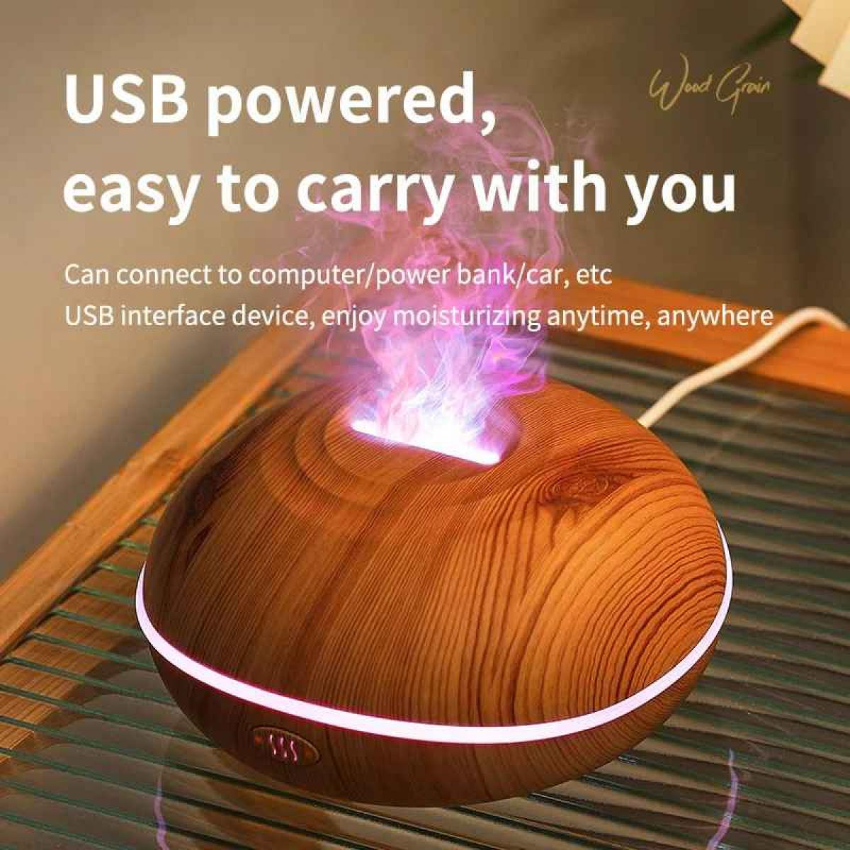Ein runder Holzmaser-Diffusor mit violettem Dampf und einem weißen Kabel.