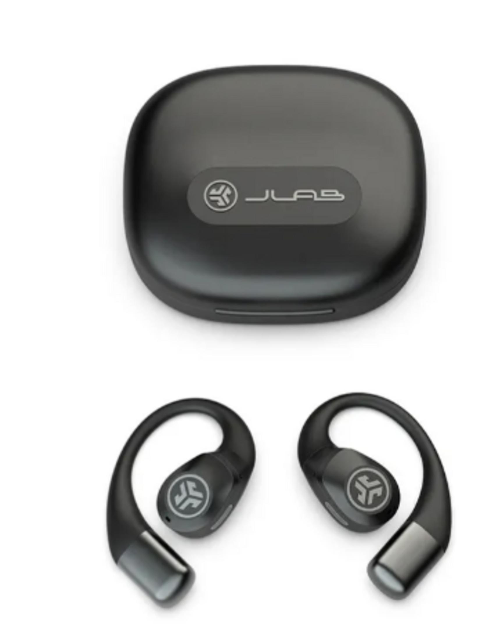 Custodia di ricarica nera con due auricolari wireless neri accanto.