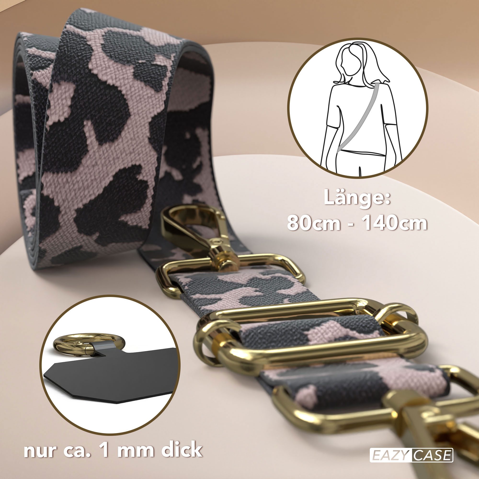 Ein schmaler Tragegurt mit Leopardenmuster, goldener Hardware und Text-Overlays.