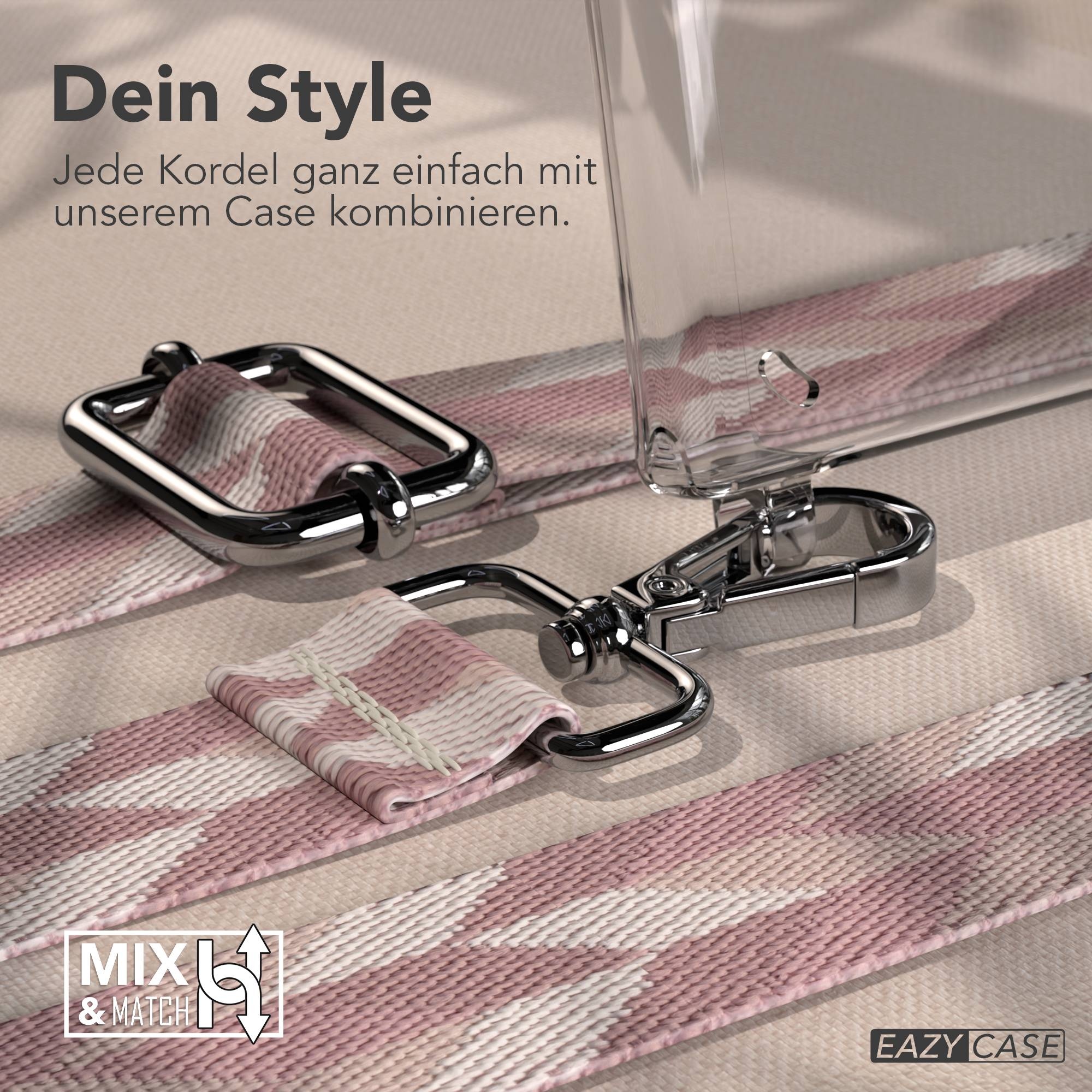Ein silberner Karabinerhaken befestigt an einem Band mit rosa und weißen Zickzackmuster.