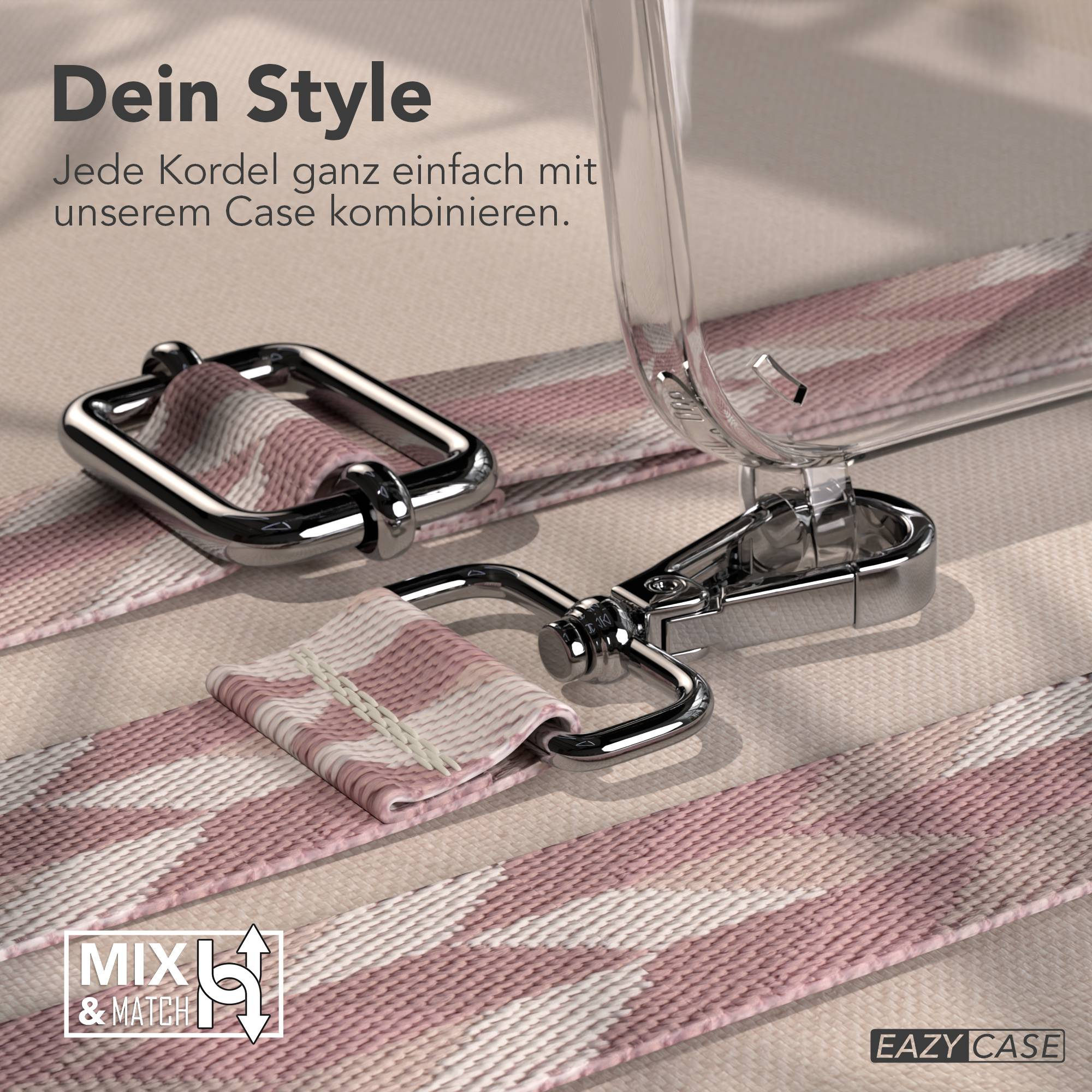 Nahaufnahme eines Handyhüllen-Riemens mit silberner Hardware und pink-weißem Muster.