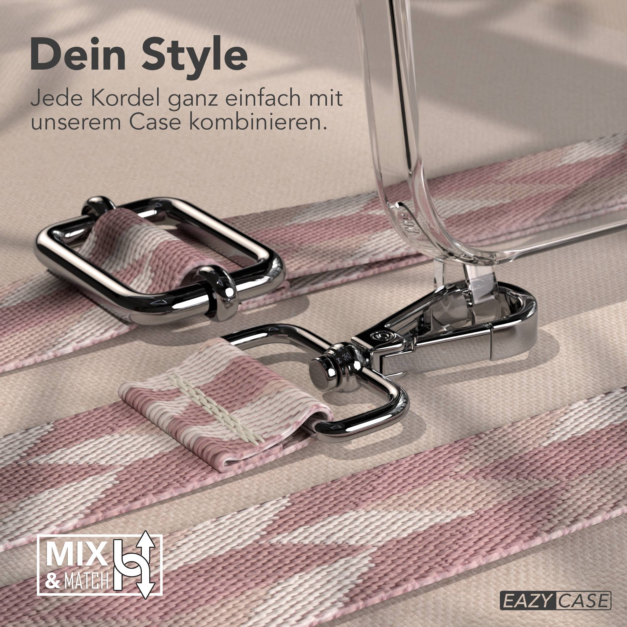 Ein Band mit pink-weißem Zickzackmuster und silbernen Beschlägen für Handyhüllen.