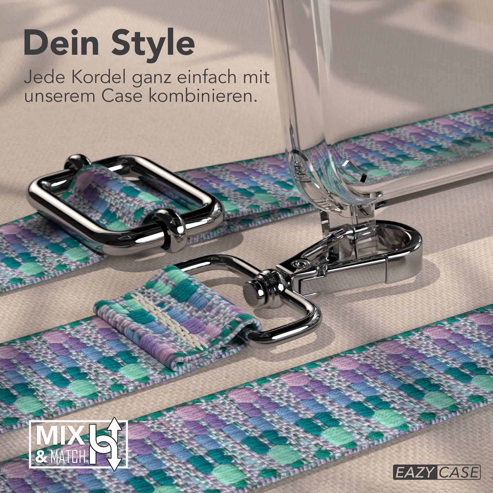 Ein Handyband mit Muster in Türkis, Lila und Blau, mit silbernen Beschlägen.