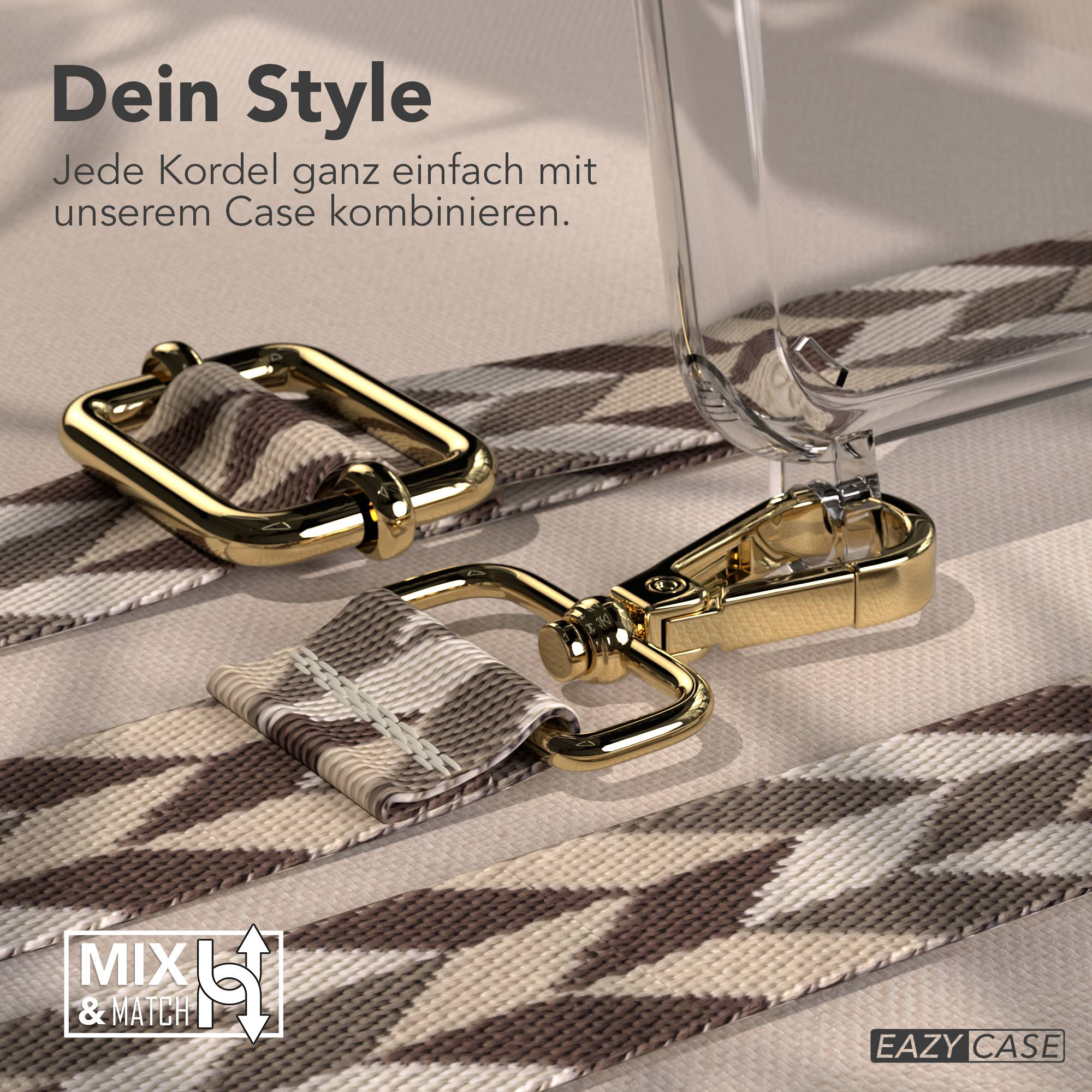 Ein goldener Karabiner mit einem gemusterten Gurt und Text.