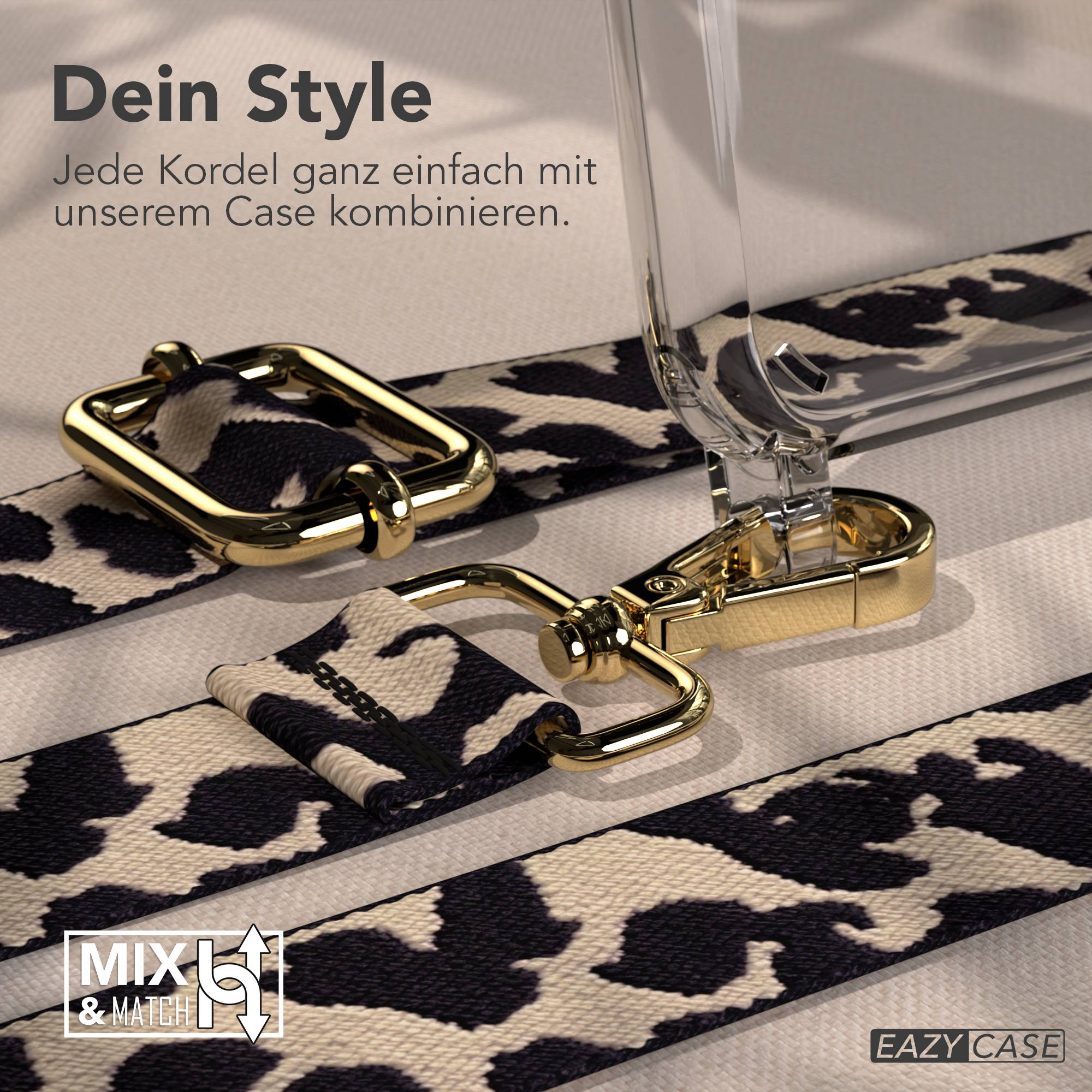 Goldene Schnallen und ein Band mit Leopardenmuster für eine Handyhülle.