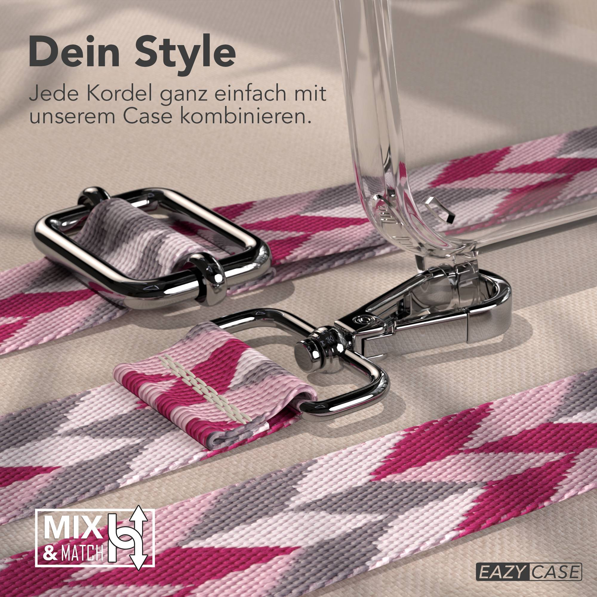 Ein Band mit pinken, grauen und weißen Zickzackmustern und silbernen Schnallen.