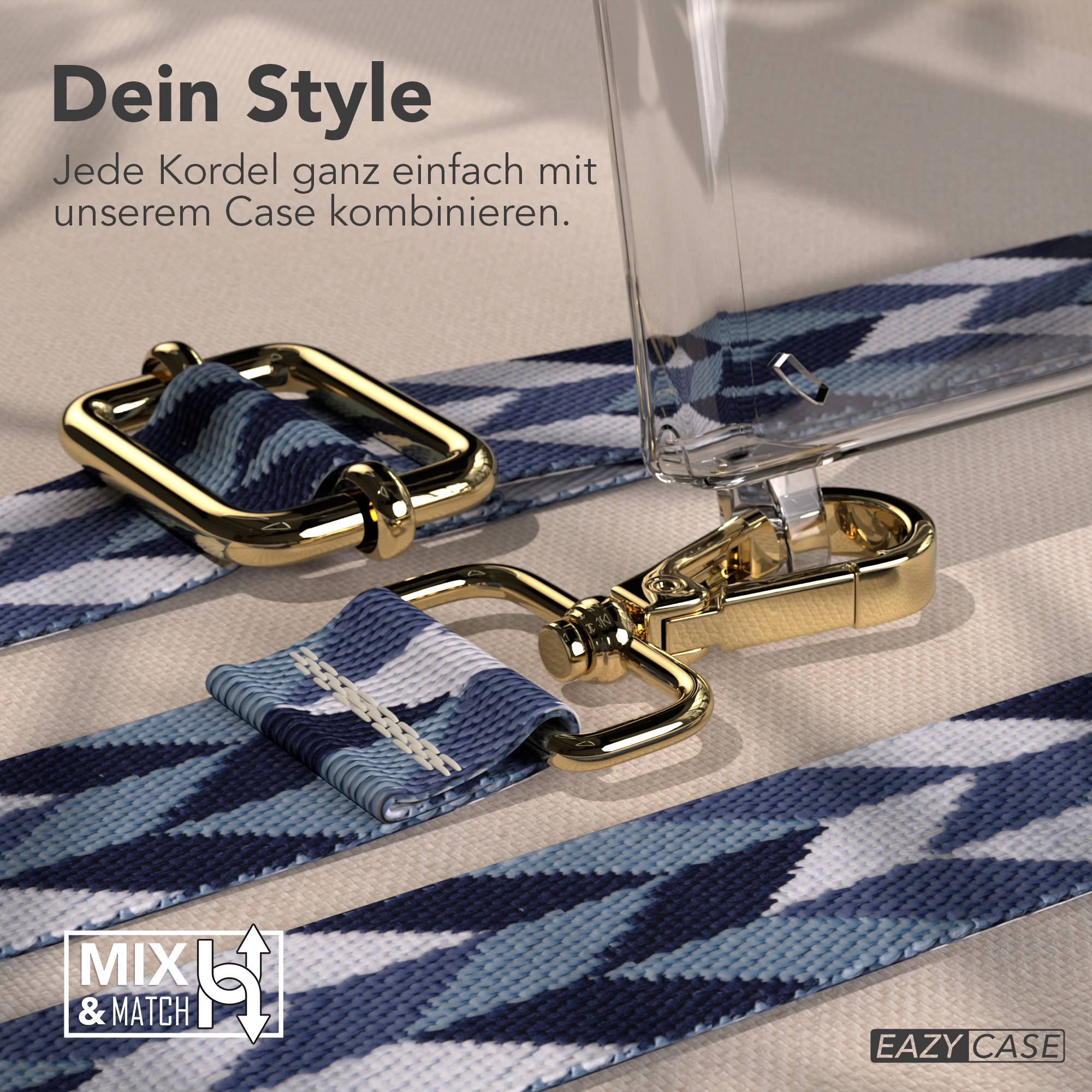 Goldene Schnallen und eine blaue Bandgarnitur mit geometrischem Muster auf einem beige Stoffhintergrund.