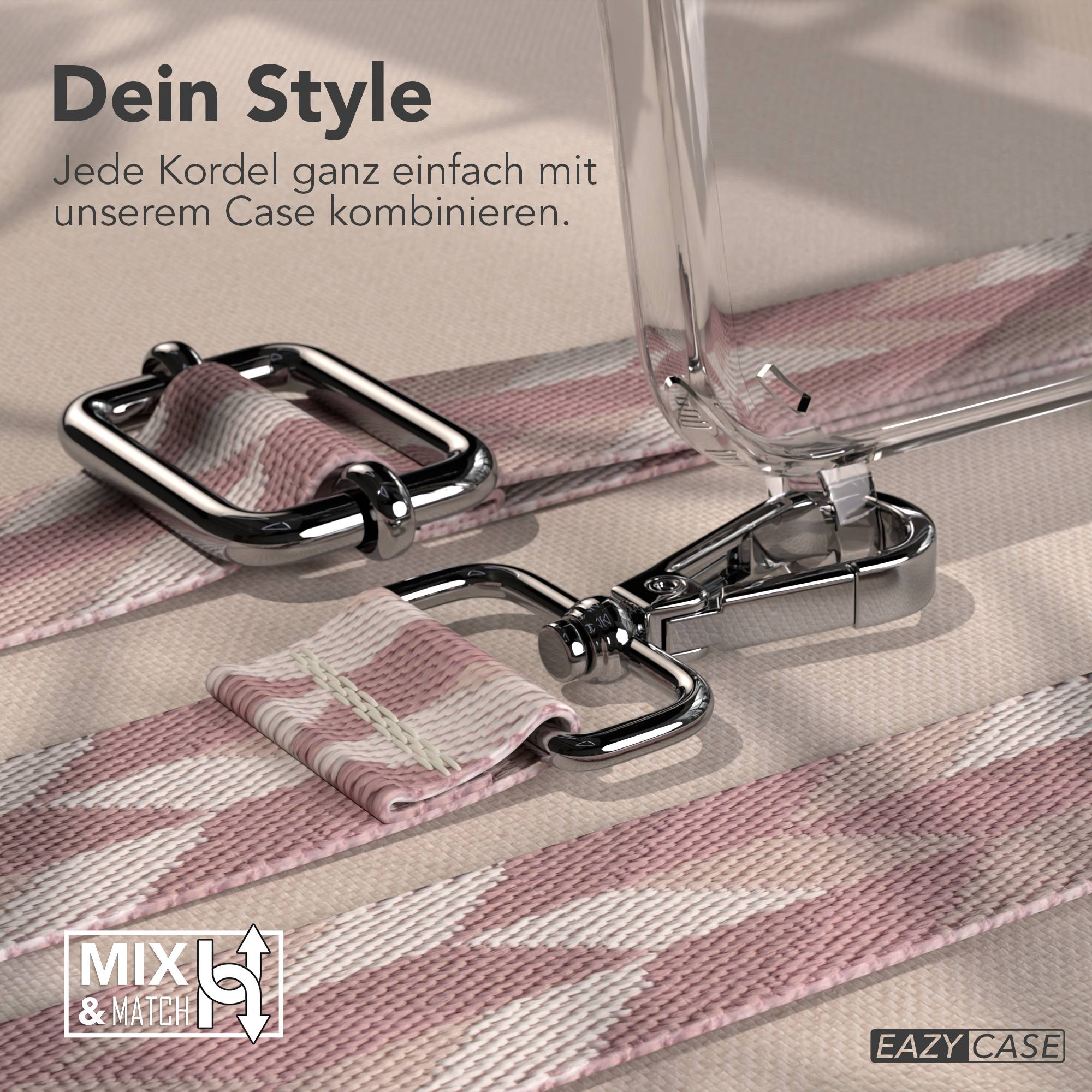 Ein pink-weiß gemustertes Band mit silberner Hardware, nahe einer klaren Handyhülle.