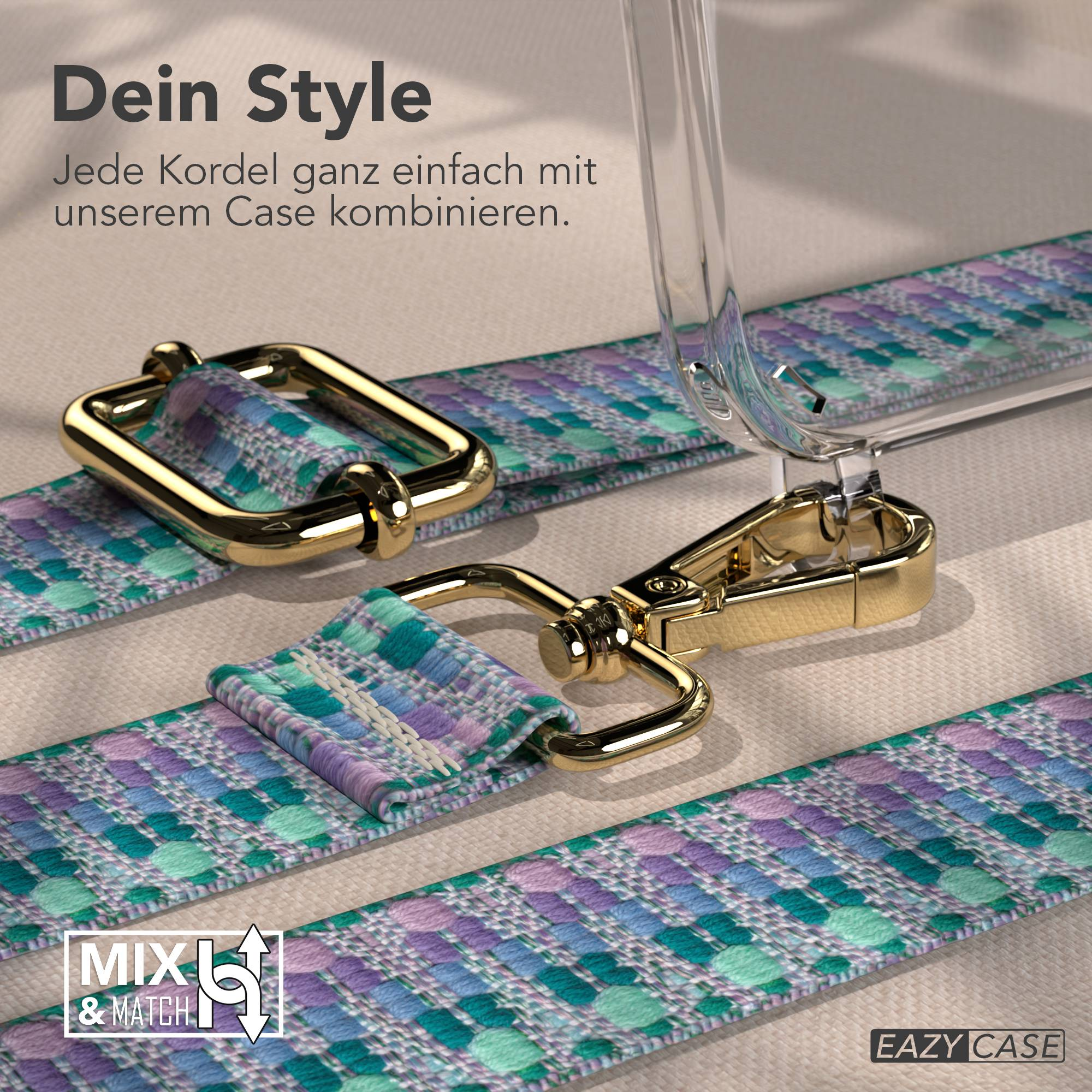 Goldene Karabinerhaken an einem gemusterten Band mit lila, blauen und grünen Mustern.