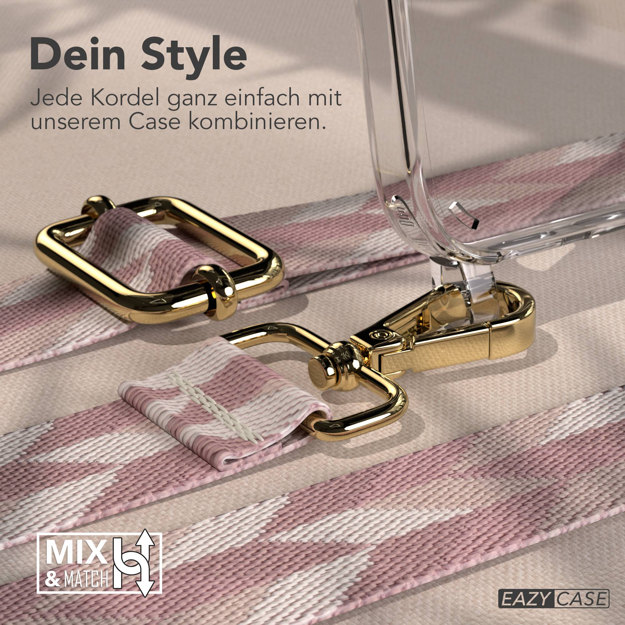 Eine durchsichtige Handyhülle mit goldener Hardware und einem pink/weiß gemusterten Riemen liegt auf einer texturierten Oberfläche.