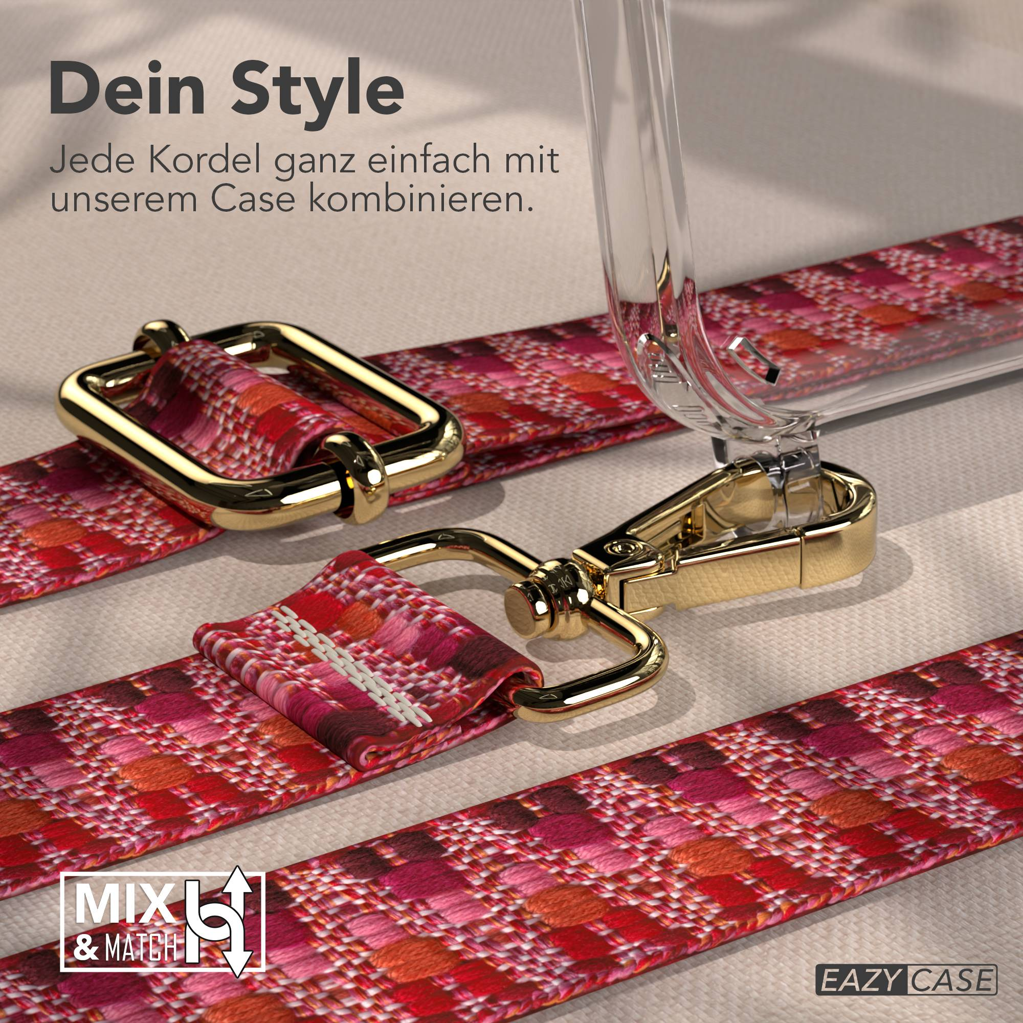Nahaufnahme eines rot-pink gemusterten Riemens mit goldener Hardware, neben einer Klarsichthülle.