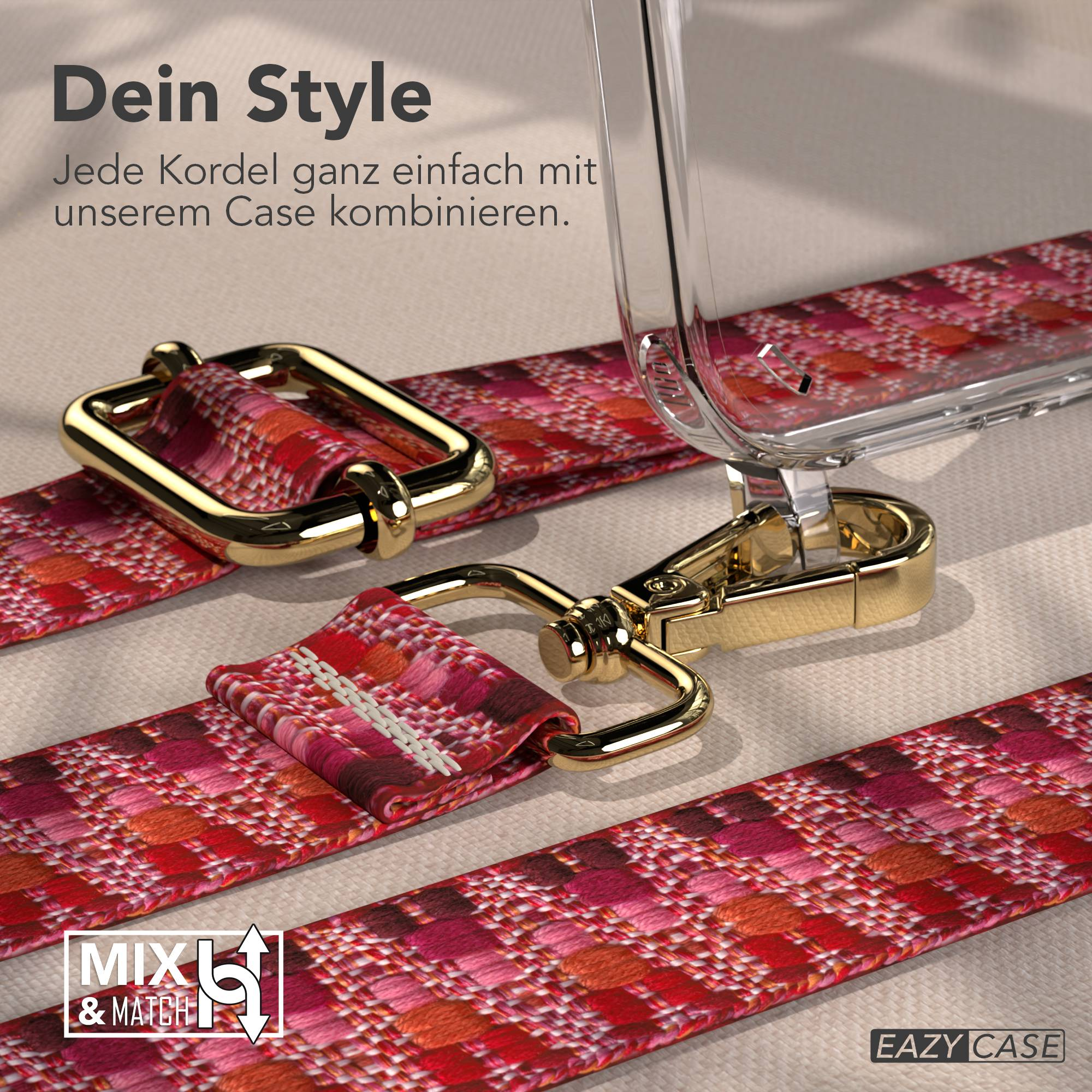 Nahaufnahme eines rot-pink gemusterten Riemens mit goldener Hardware und Hülle.