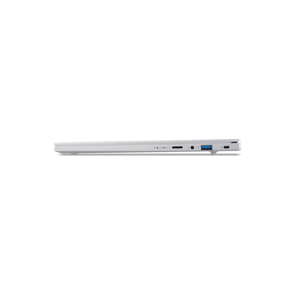 Vista laterale di un laptop bianco con porte USB-A e slot per schede SD.