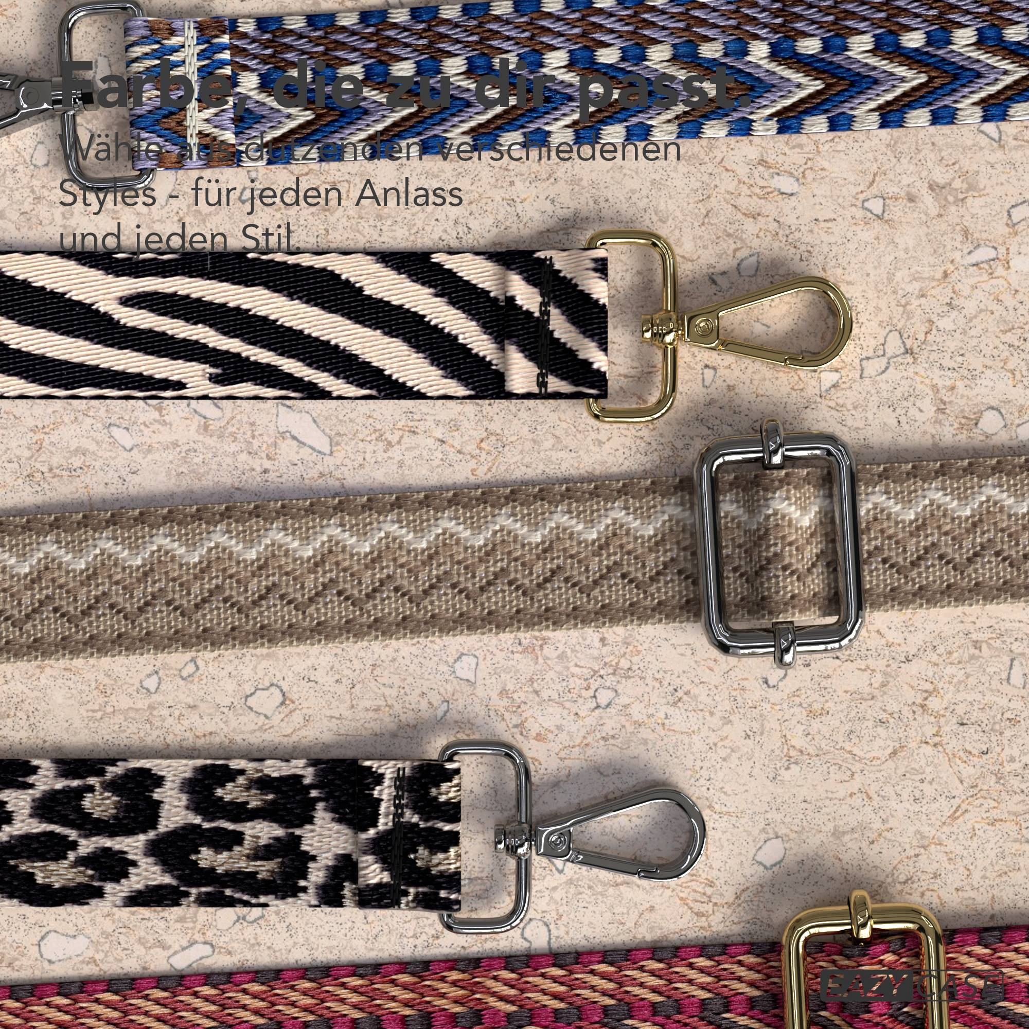 Mehrere Taschenriemen mit Mustern wie Zickzack, Zebra und Leo-Print.