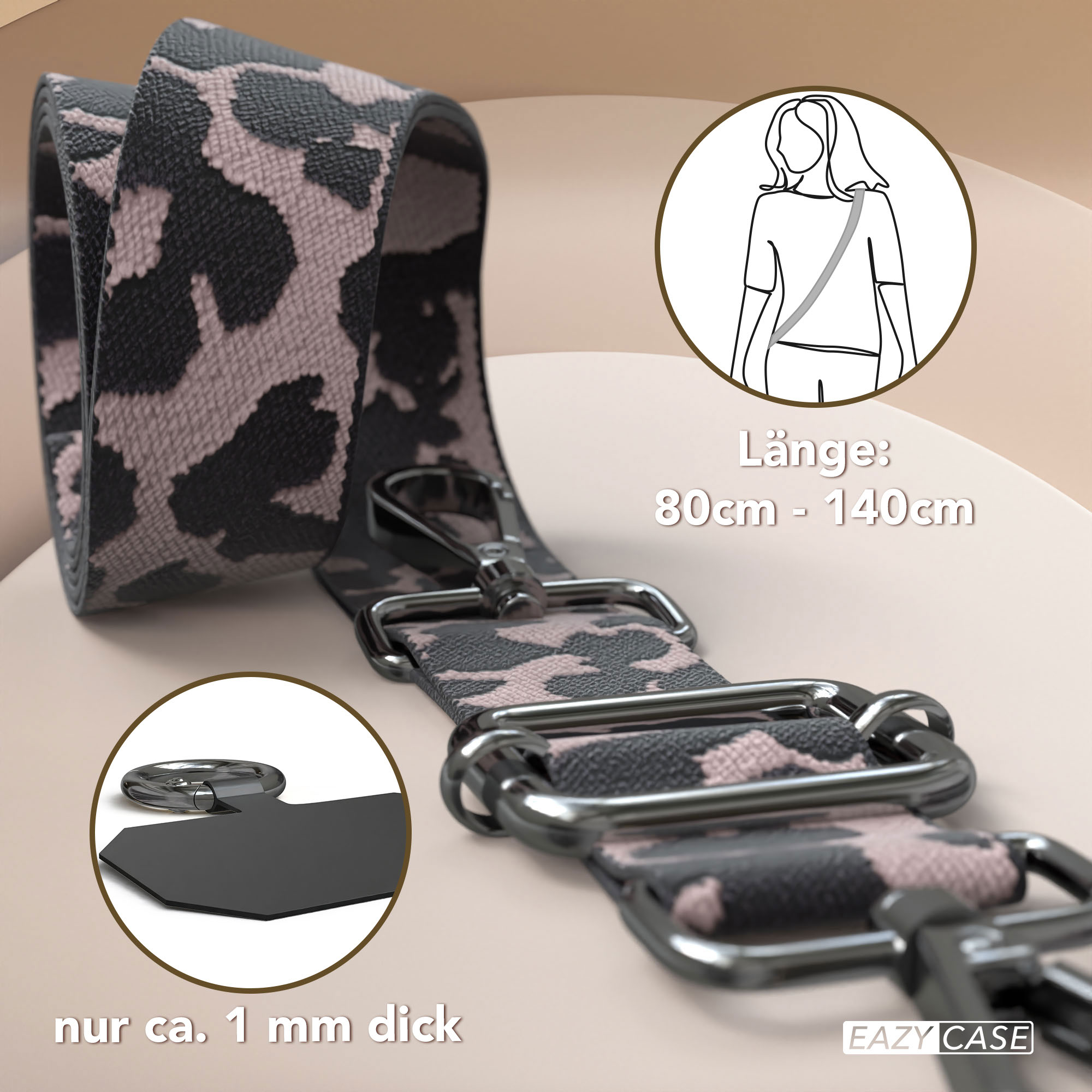 Ein Band mit Leopardenmuster in Rosa und Schwarz mit silbernen Schnallen.