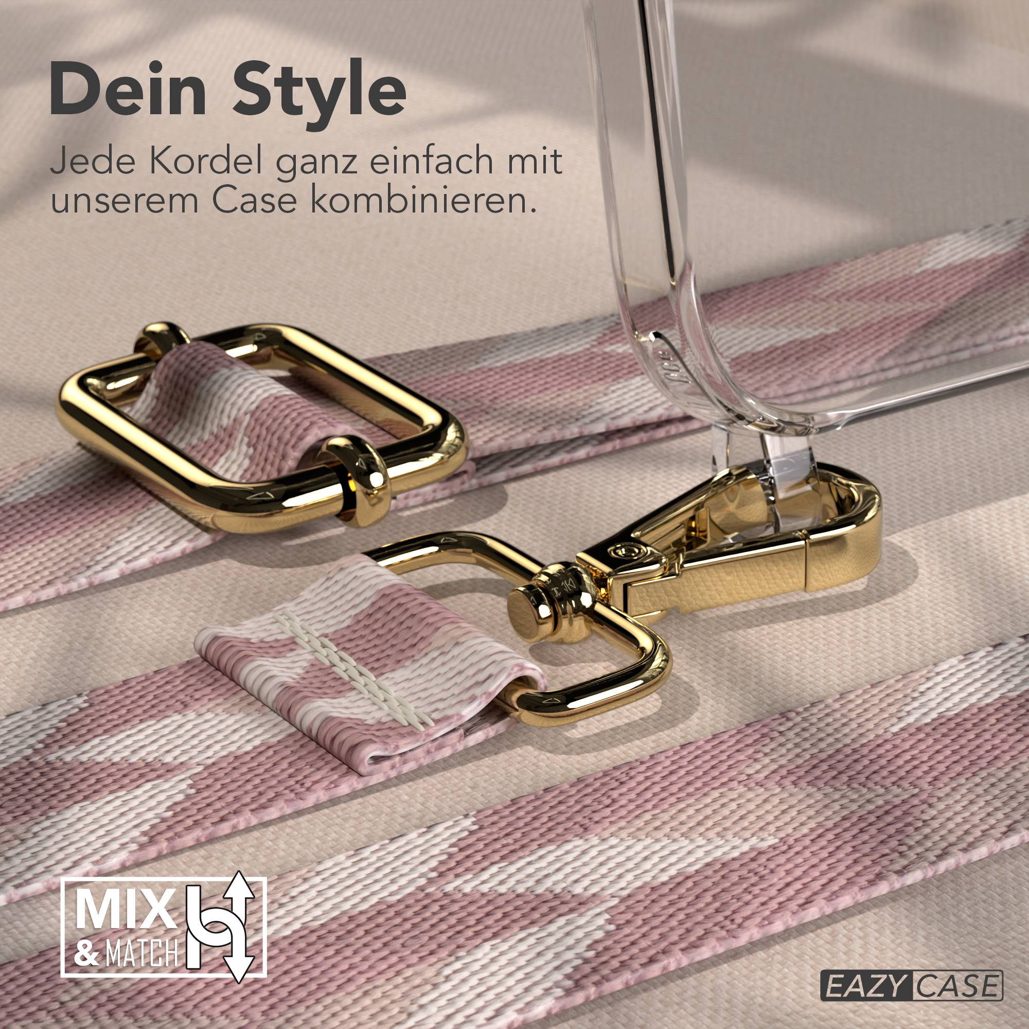 Ein goldener Karabinerhaken an einer Kordel mit rosa und weißen Mustern.