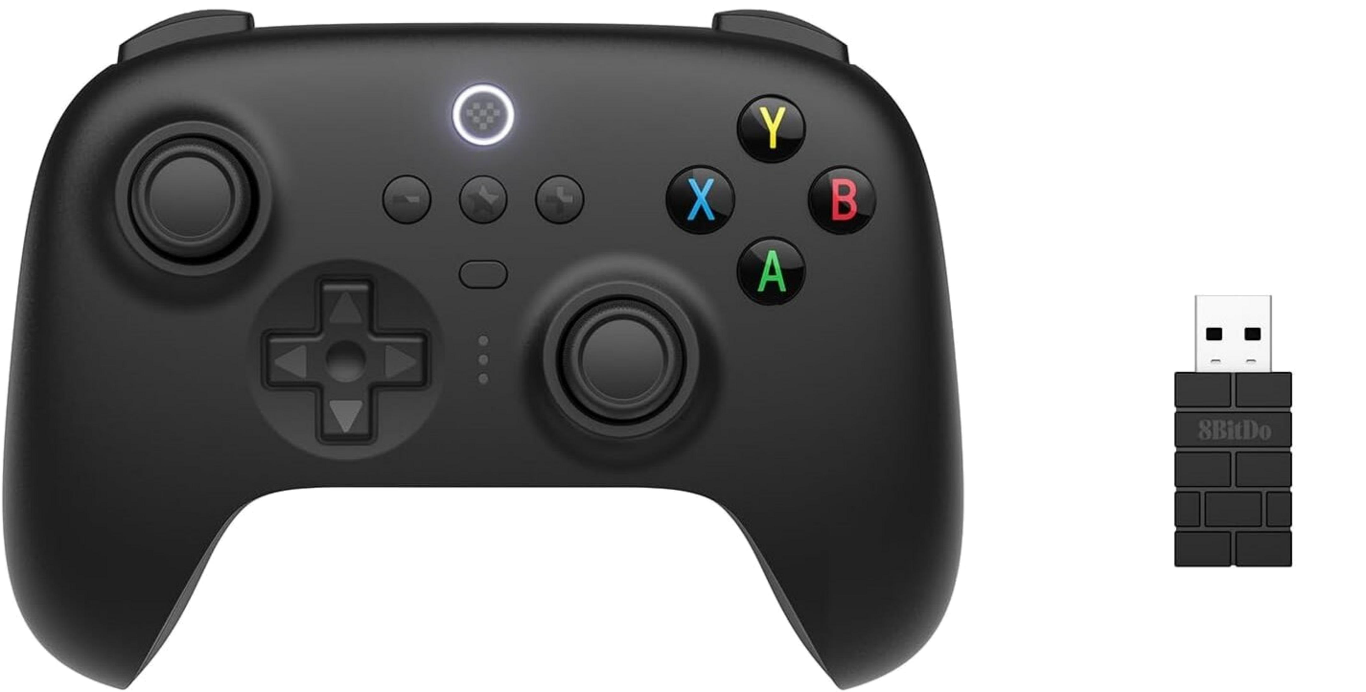 Czarny kontroler do gier z kolorowymi przyciskami i odbiornikiem USB.