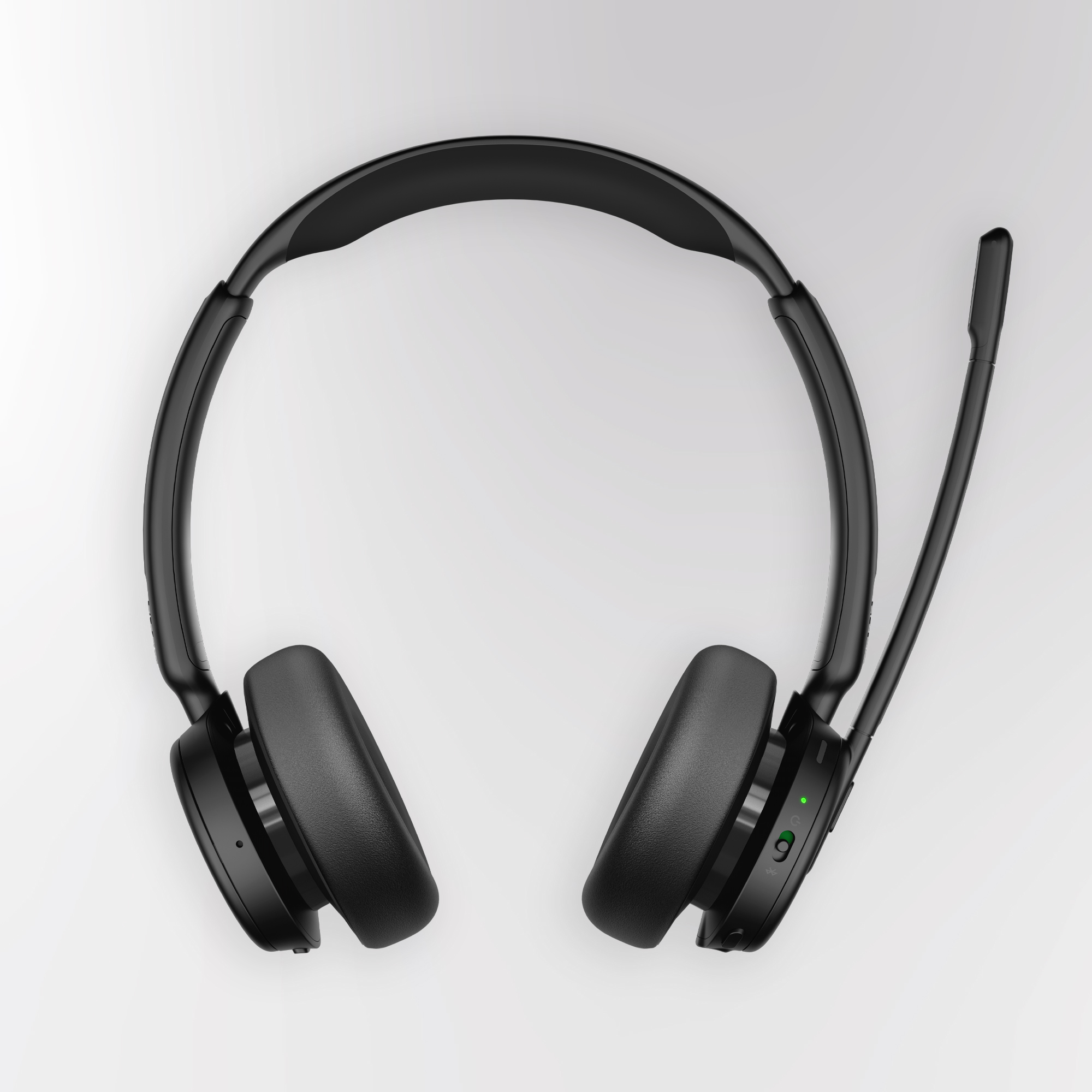 Cuffie wireless over-ear nere con microfono e LED verde.