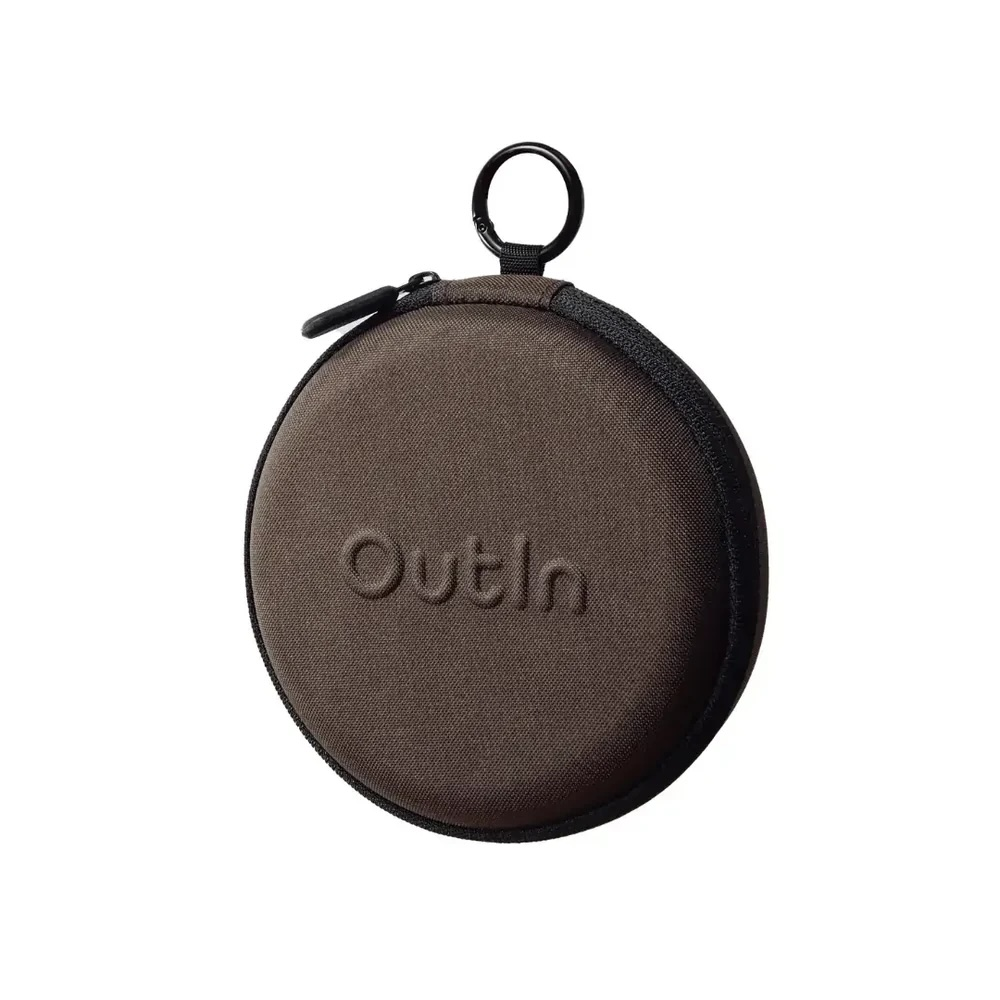 A brown circular case with a zipper and a metal ring on top. The word 'Outin' is embossed.