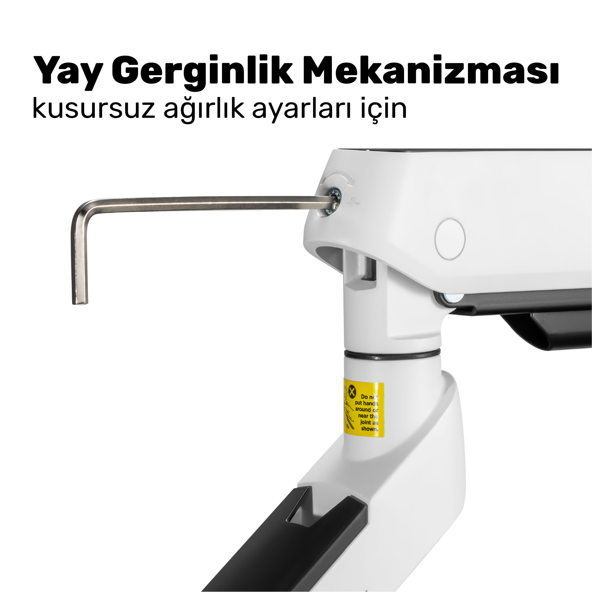 Bir alyan anahtar beyaz bir mekanizmaya takılıyor.
