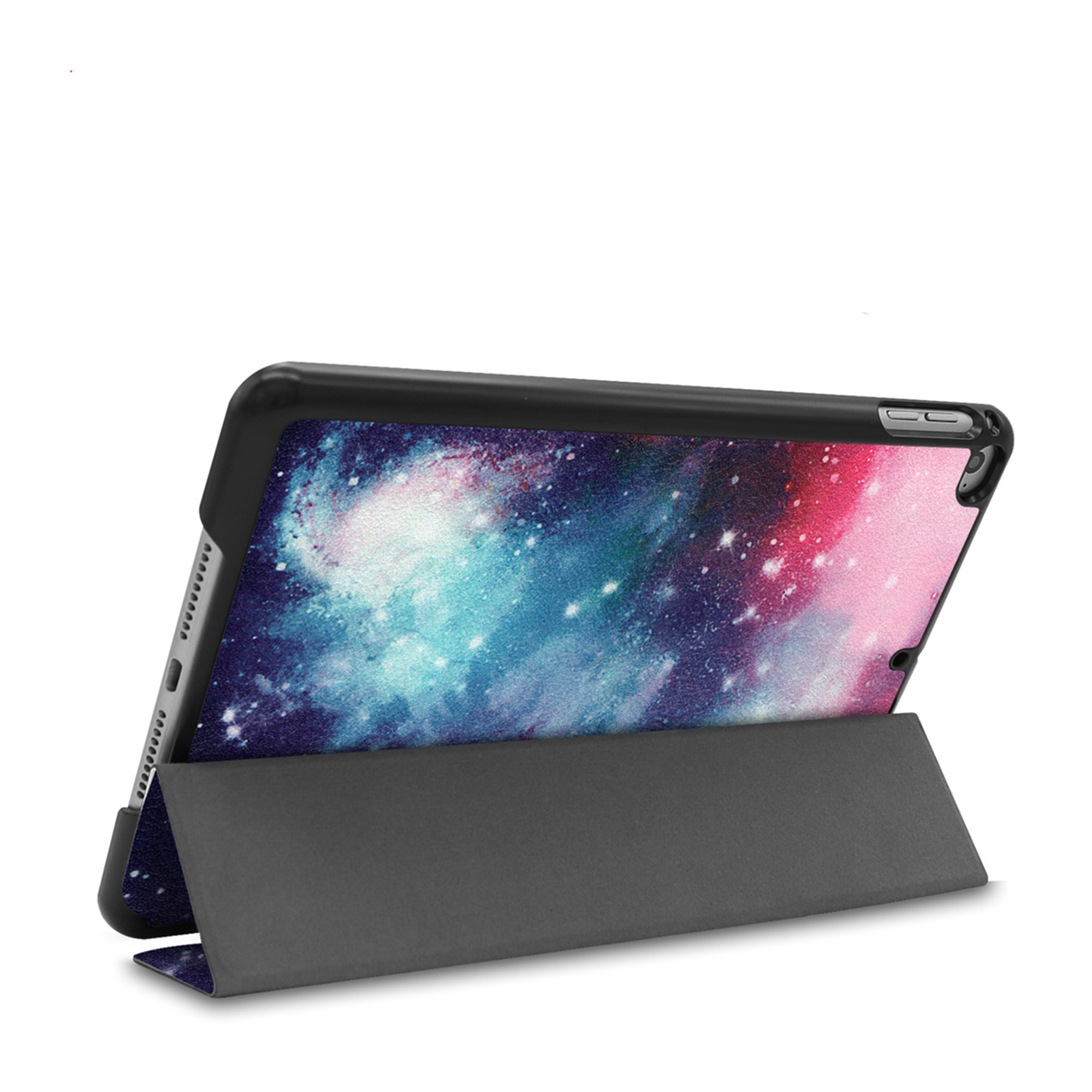 A tablet in a black case with a galaxy pattern, propped up.
