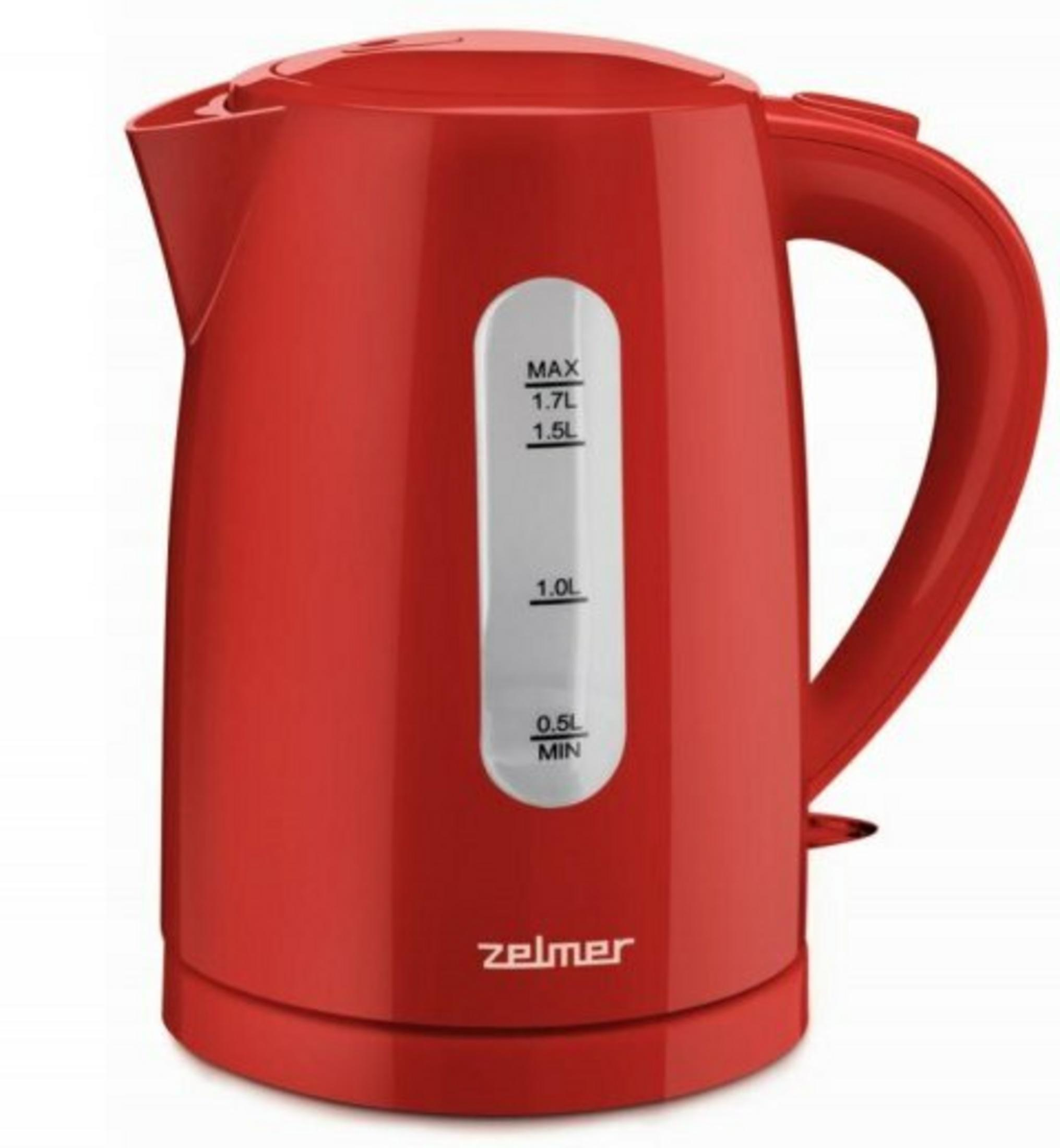 Un bollitore elettrico rosso con indicatore trasparente del livello dell'acqua e manico nero.