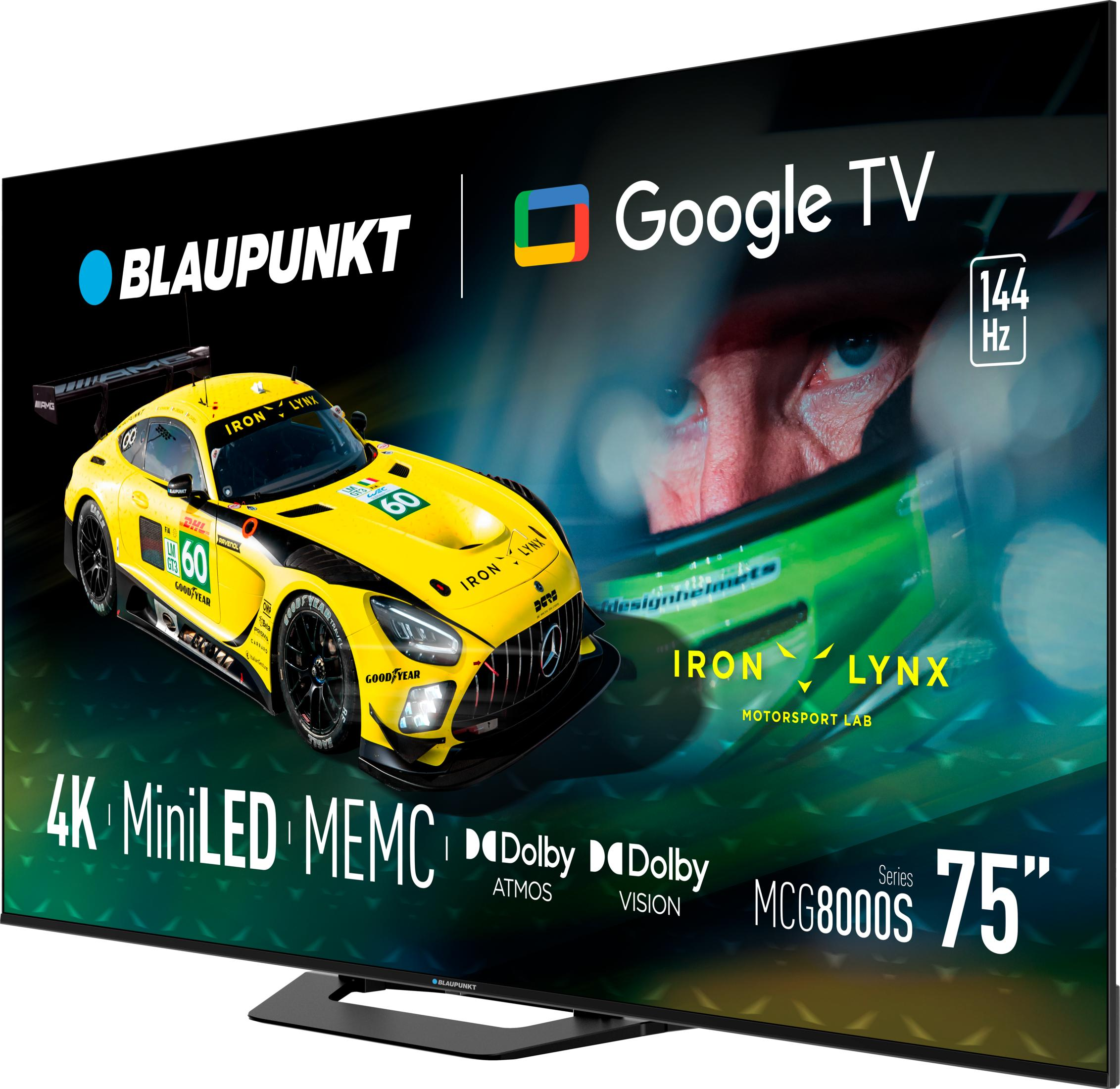 Żółty samochód wyścigowy z logo Blaupunkt i Google TV, telewizor 4K Miniled 75 cali.