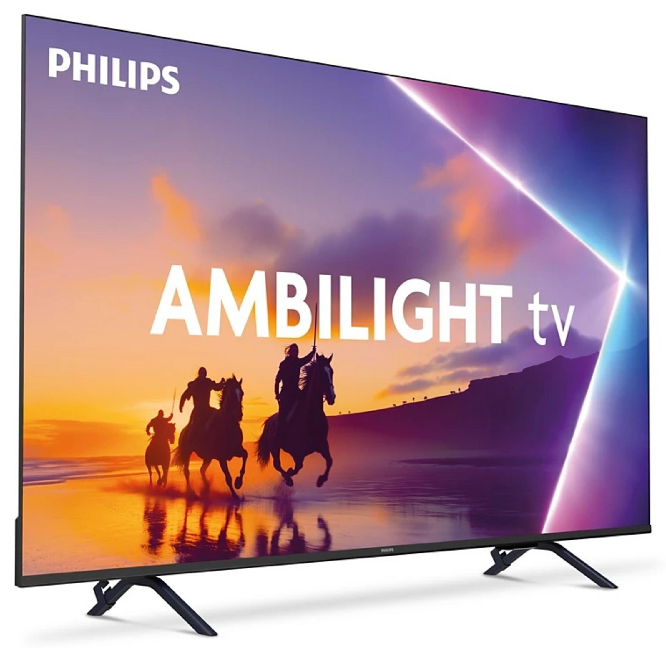 Telewizor Philips Ambilight wyświetla scenę trzech jeźdźców na koniach na plaży.